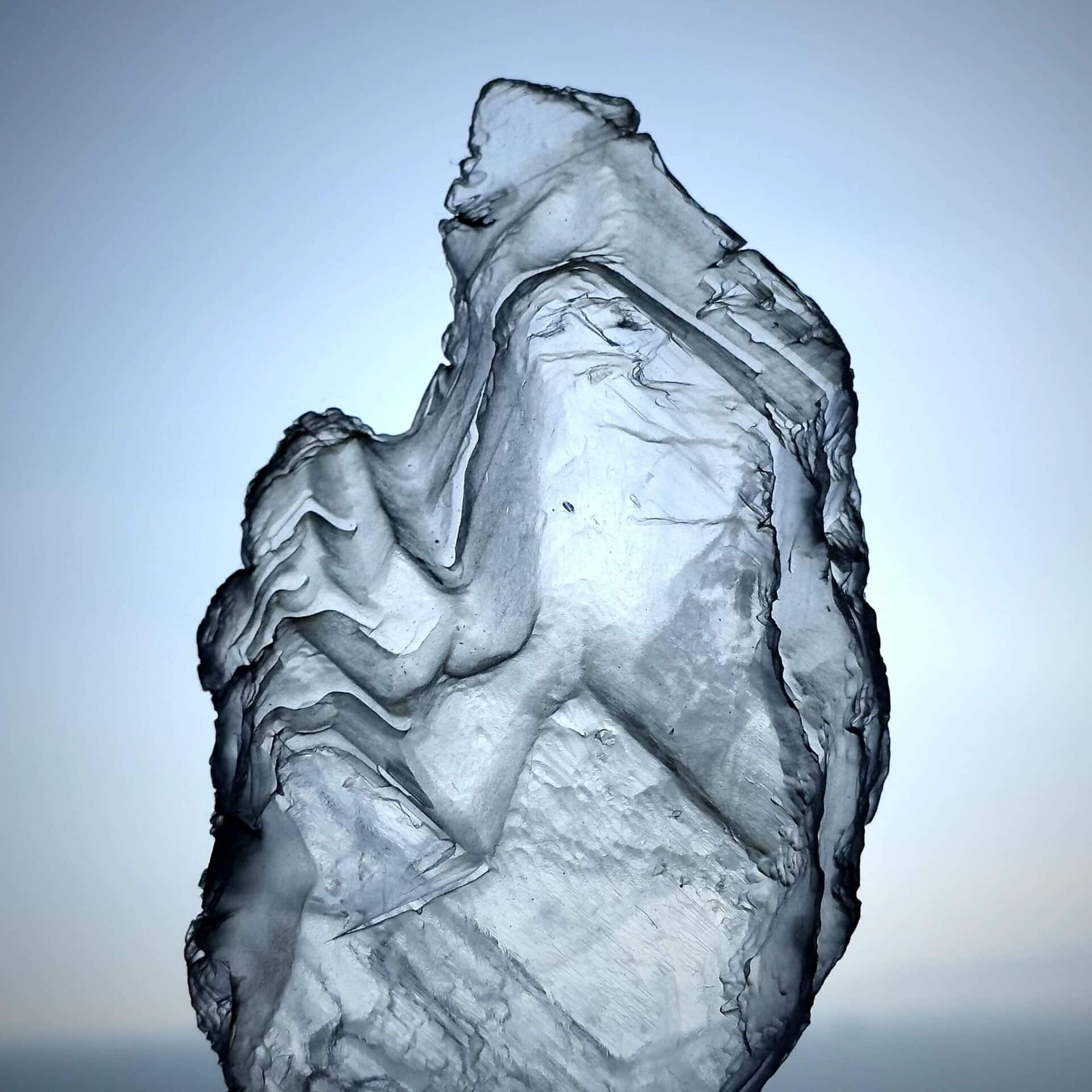 White selenite wand used for calming and cleansing.