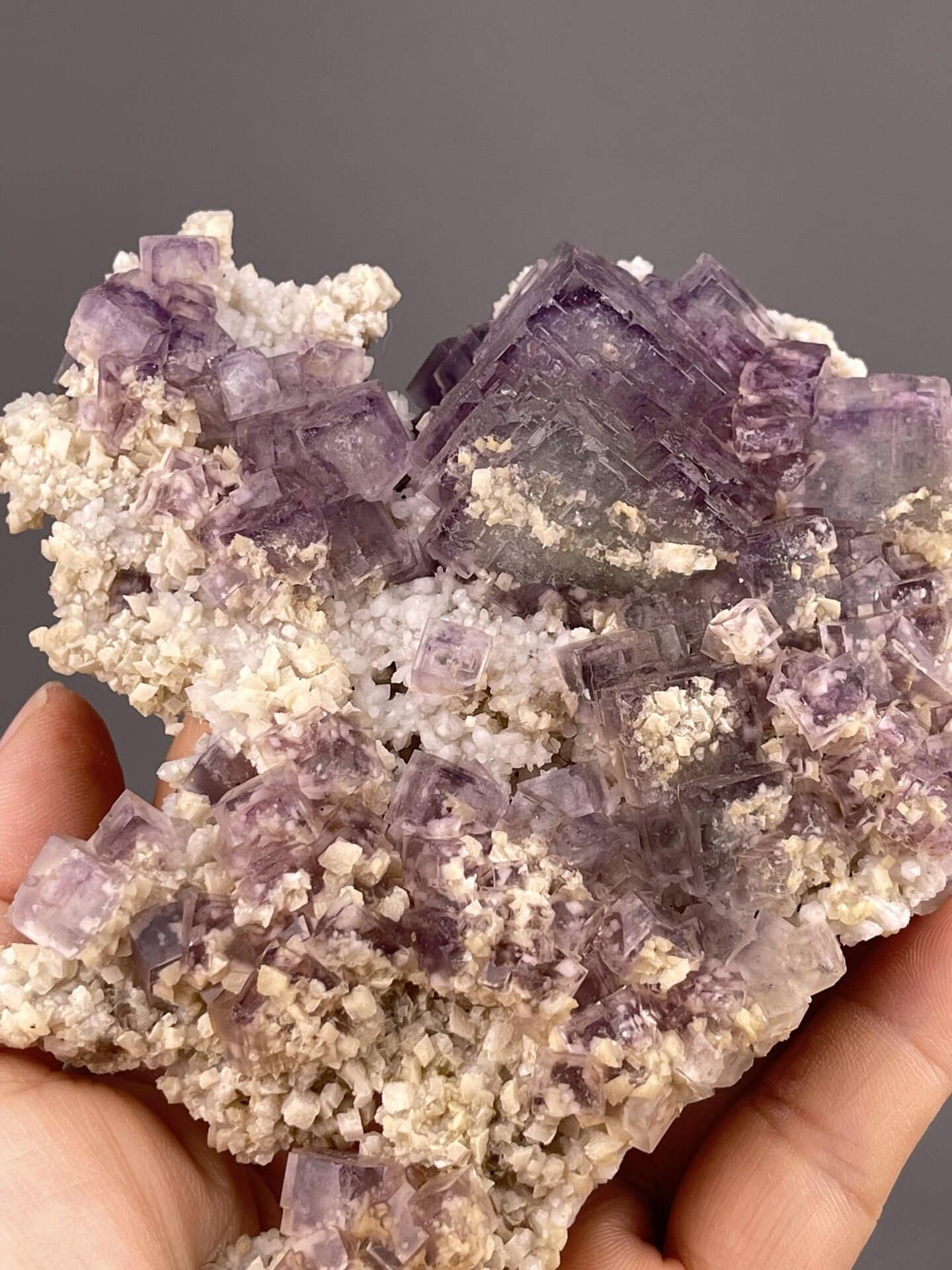 Green Fluorite Crystal Cluster from Shangbao Mine, Hunan – angled view showing matrix