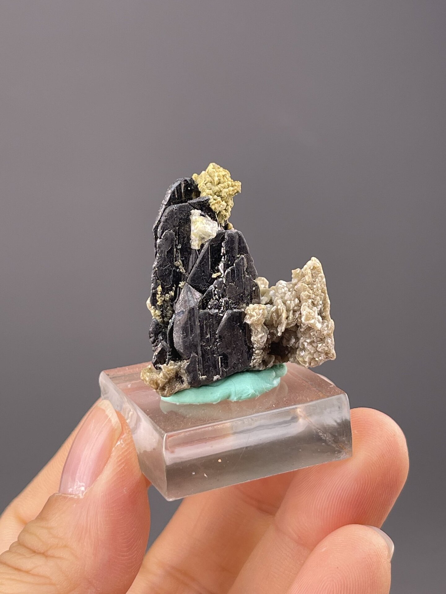 Metallic cassiterite showing prismatic tetragonal habit, 0.5 g