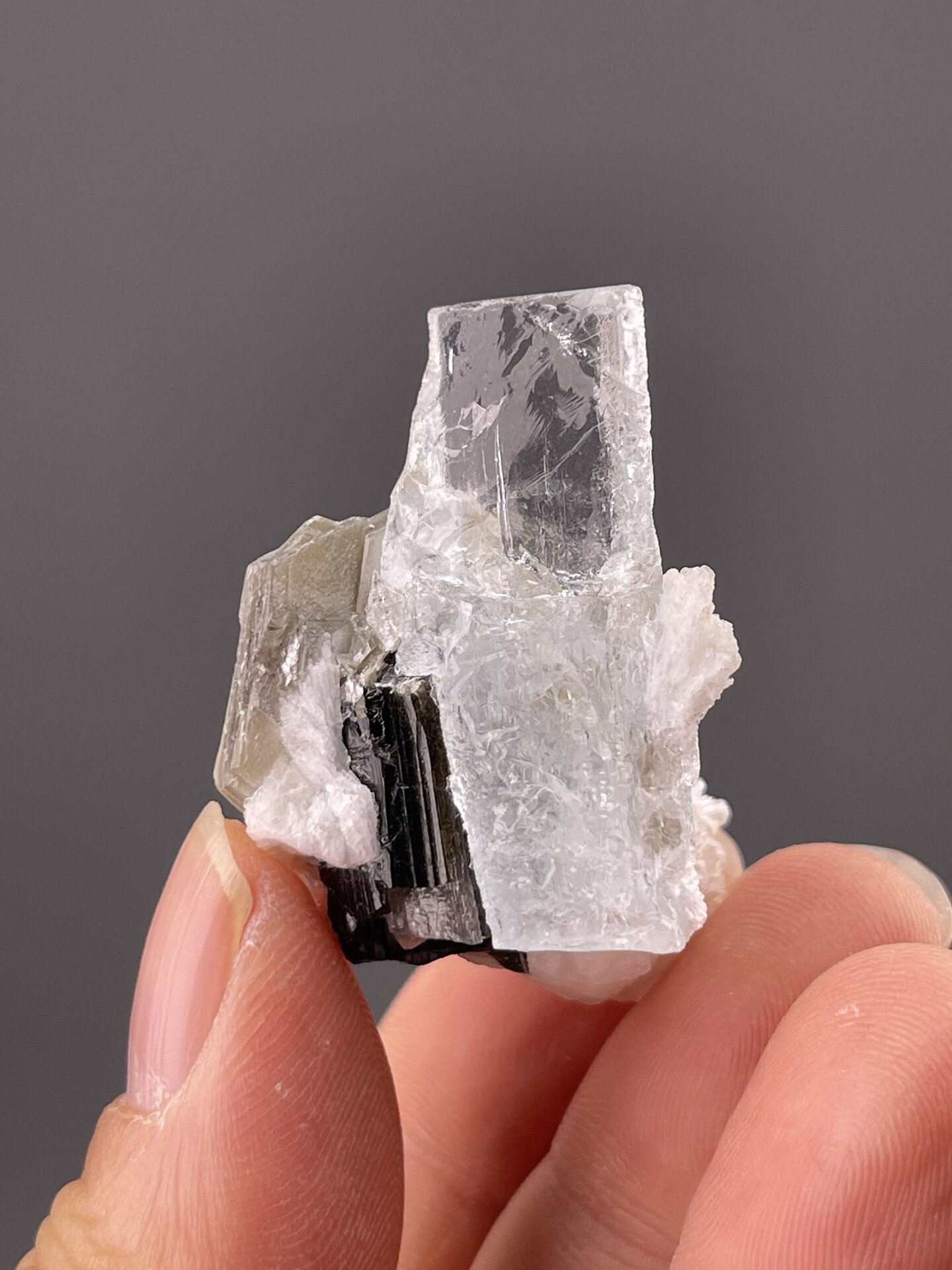Top view of aquamarine crystal showing hexagonal cross-section