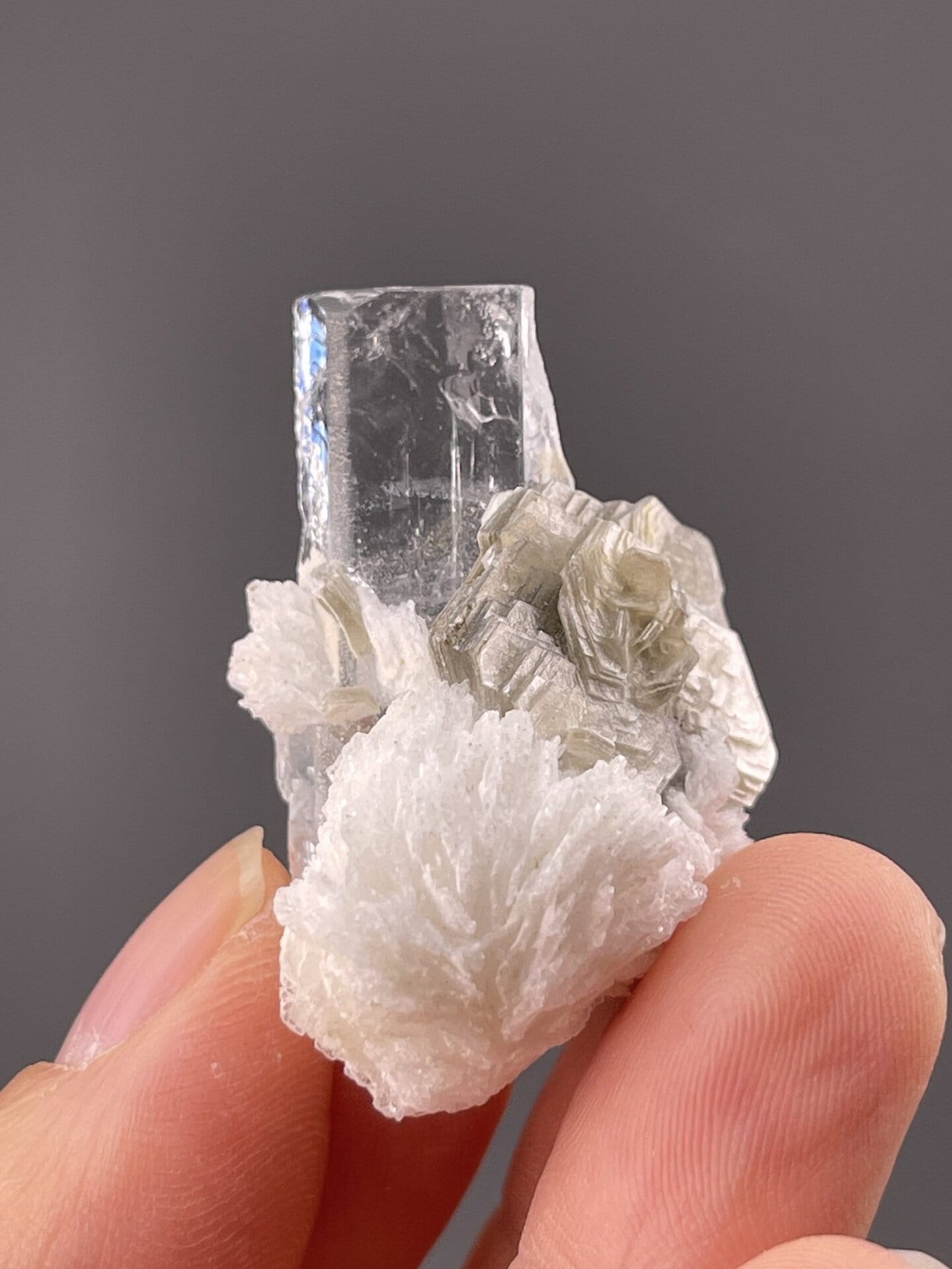 Detail of aquamarine surface showing vitreous luster and blue tone