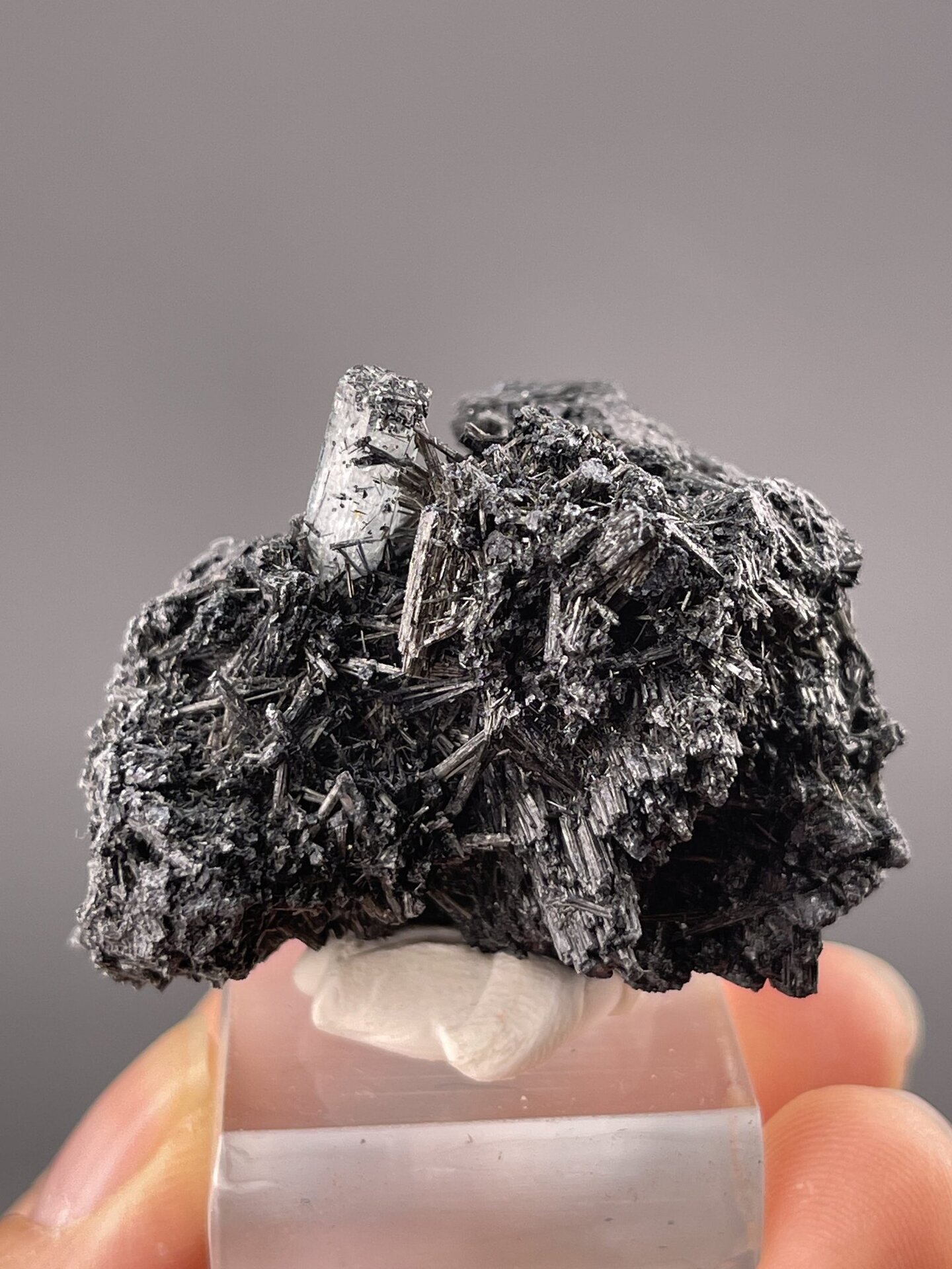 Detail of aquamarine surface showing vitreous luster and blue hue