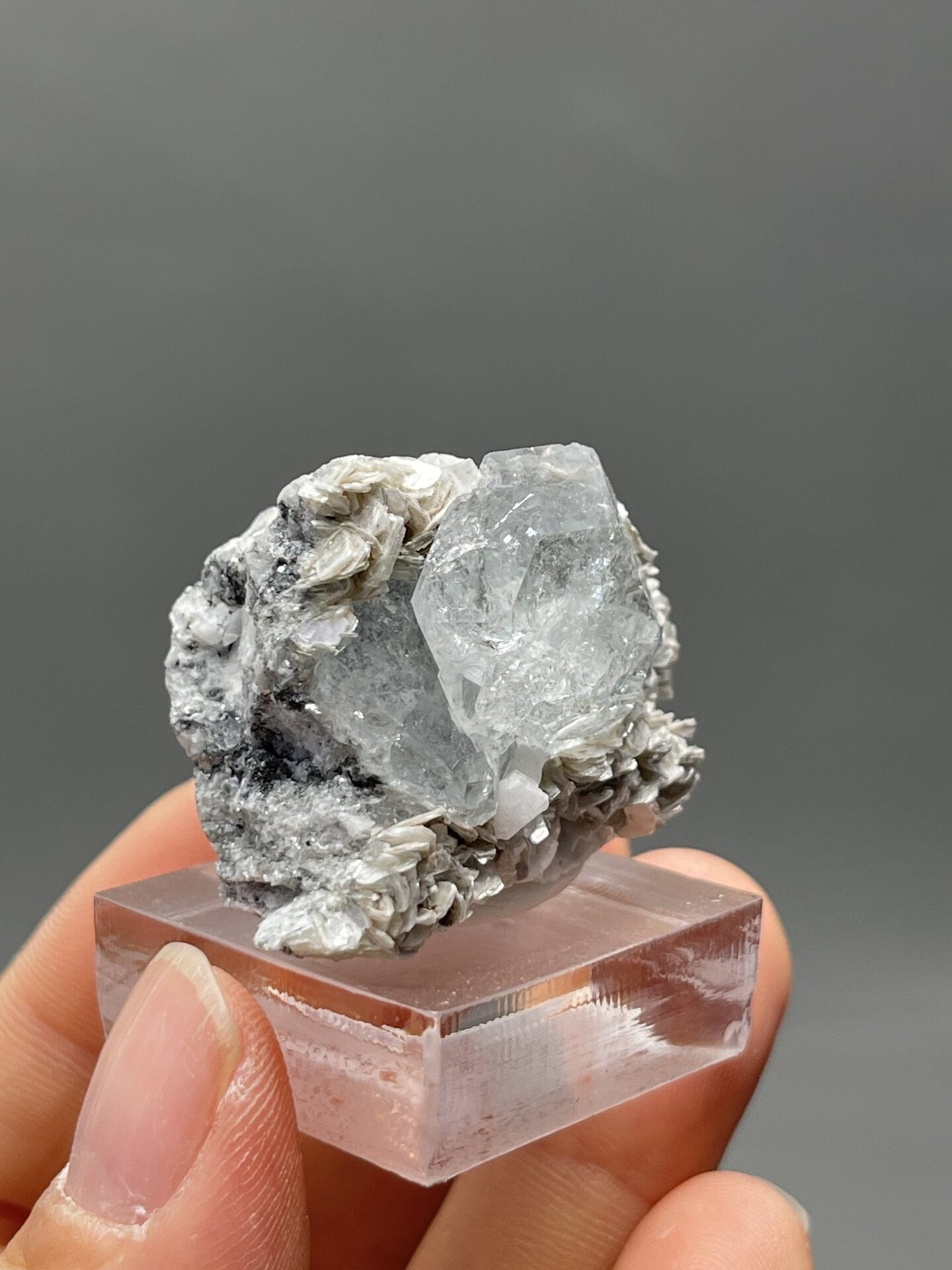 Top view of aquamarine crystal showing hexagonal cross-section