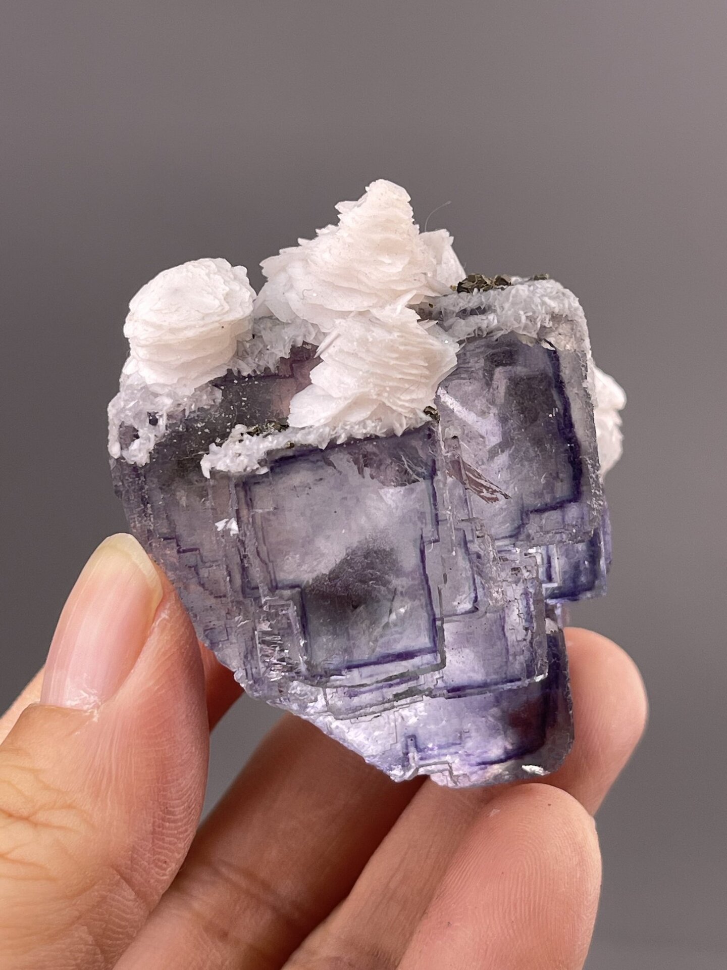 Fluorite Cubic Crystals from Chenzhou, China – angled view showing matrix