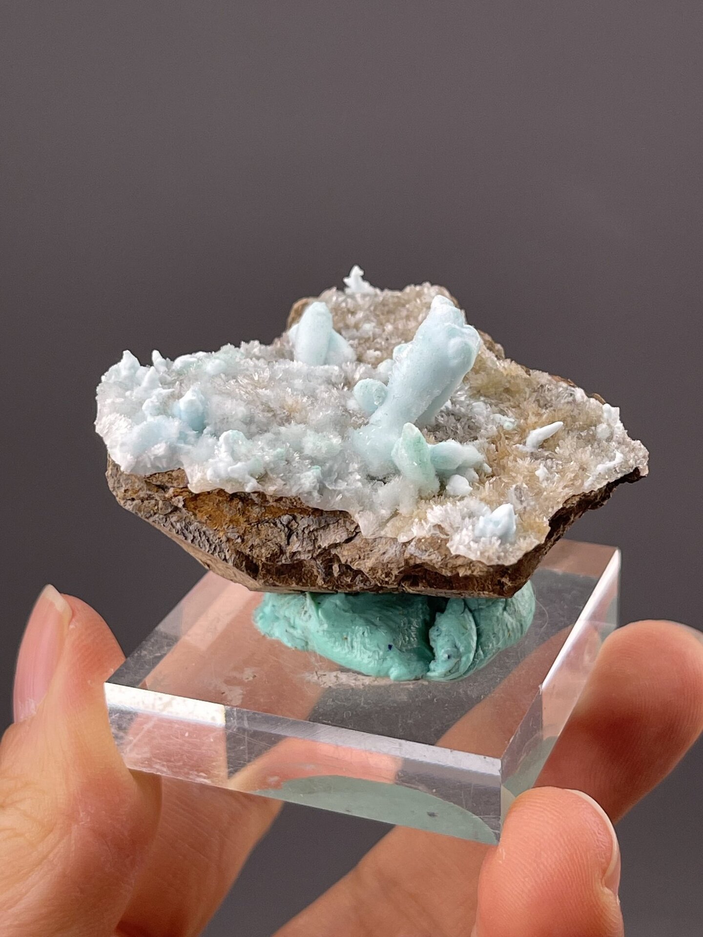 Close-up of hemimorphite crystal faces showing pale blue colour