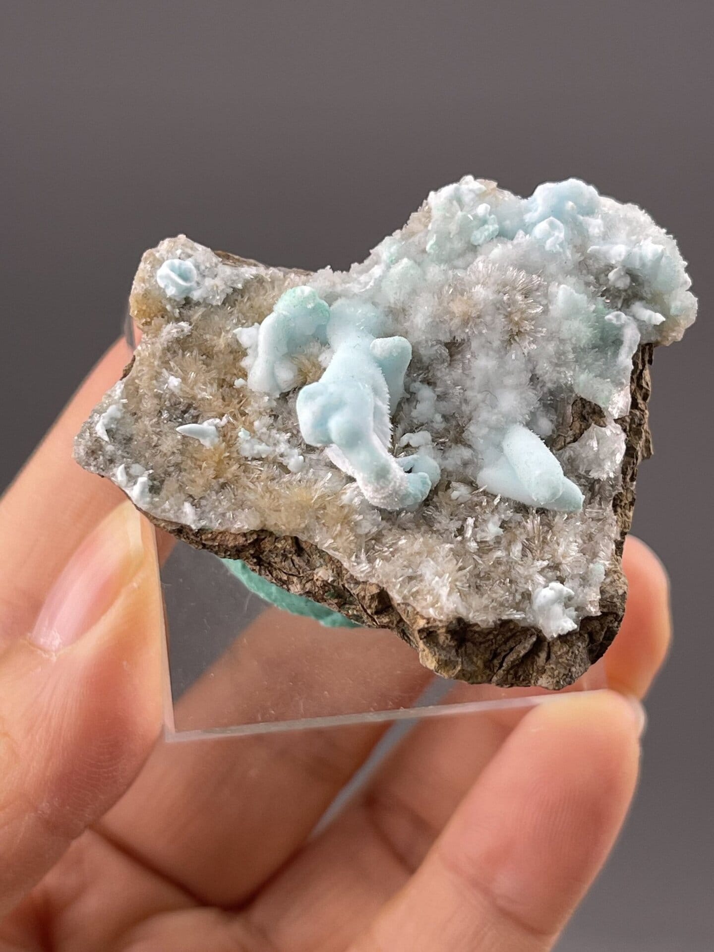 Detail of hemimorphite crystals showing vitreous to silky sheen