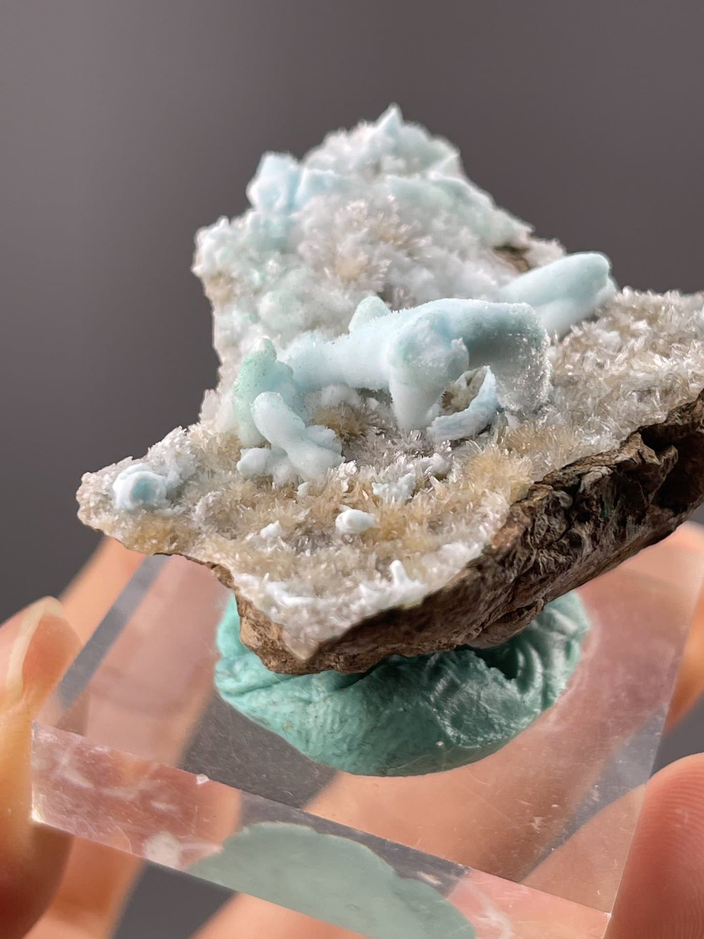 Angled view of Yunnan hemimorphite highlighting pale blue translucency