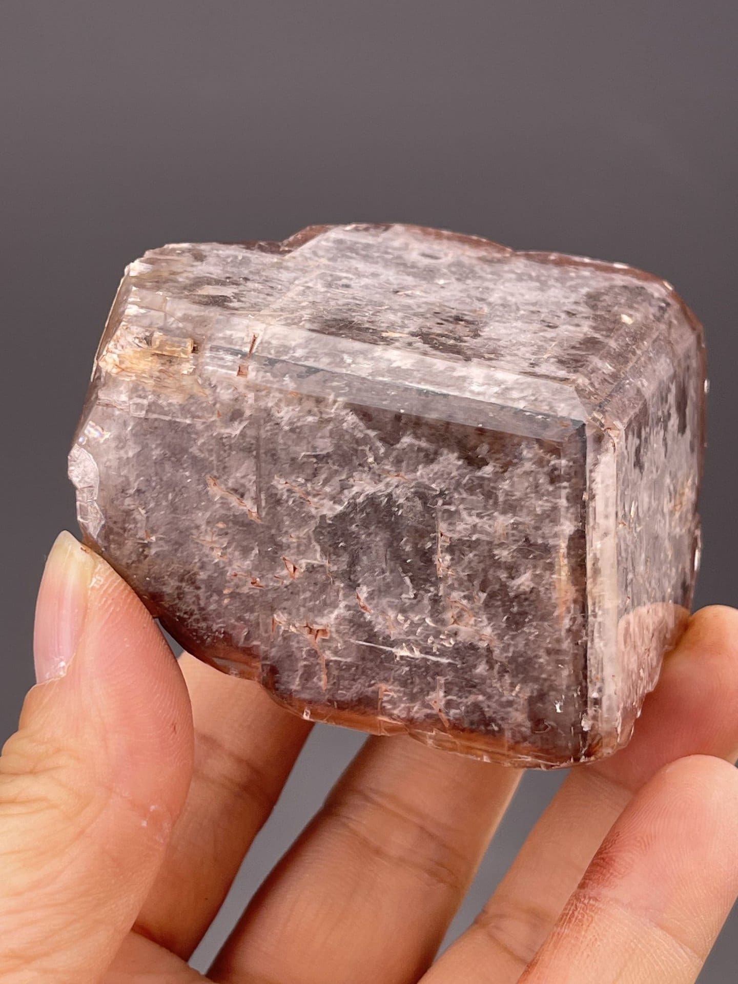 Close-up of calcite showing chocolate-brown colour and faces