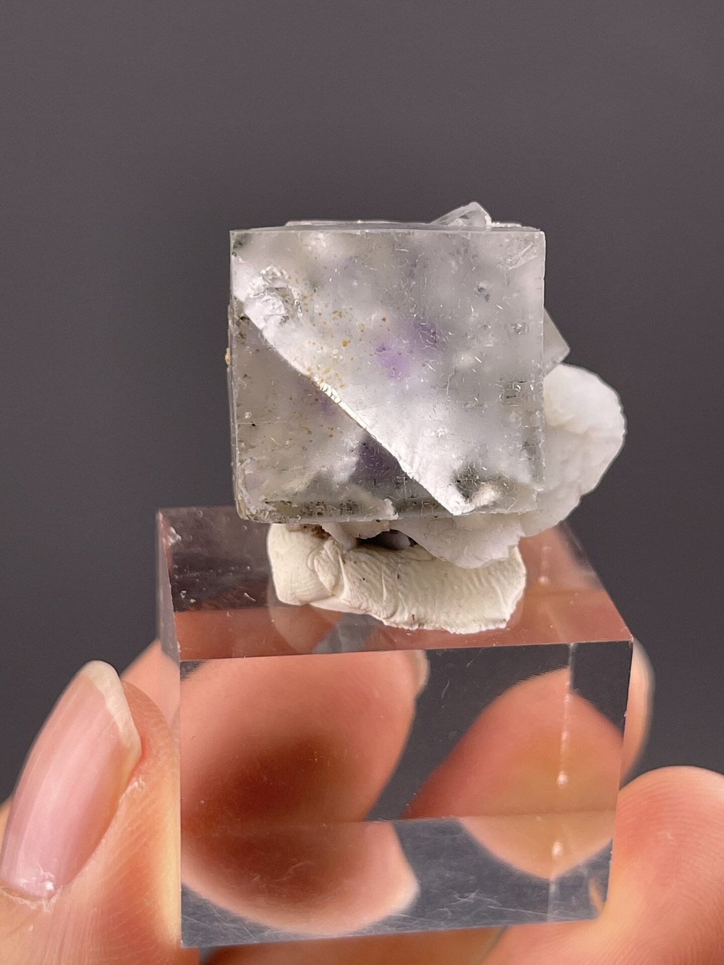 Close-up of fluorite cubic faces showing perfect transparency