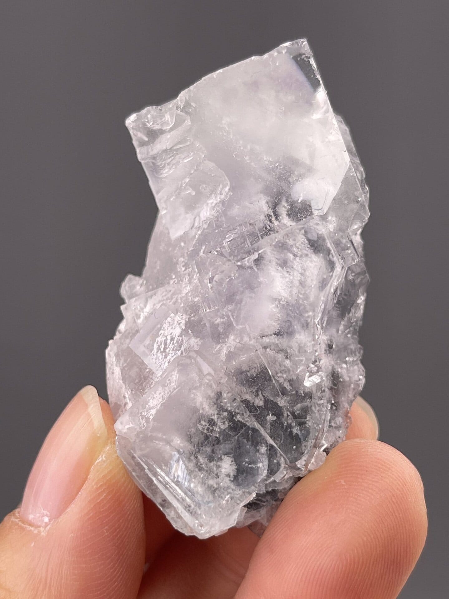 Detail of fluorite surface showing iridescent to vitreous luster