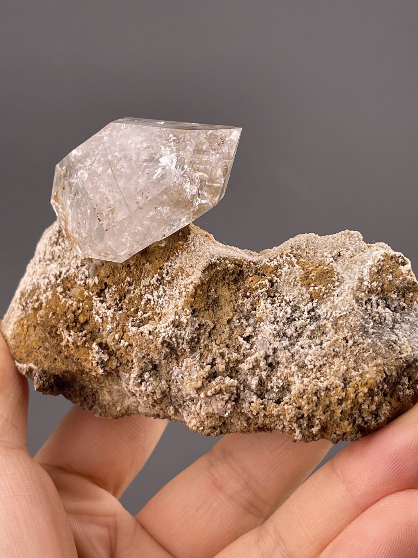 Close-up of quartz crystal termination showing prismatic facets