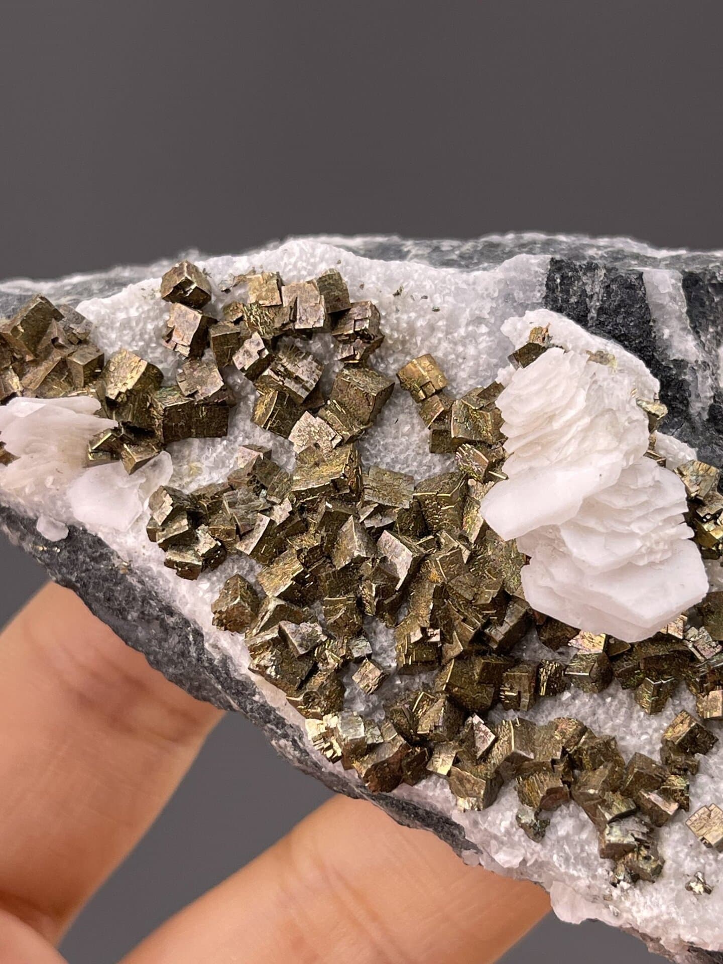 Top view of pyrite cluster showing interlocked crystal faces