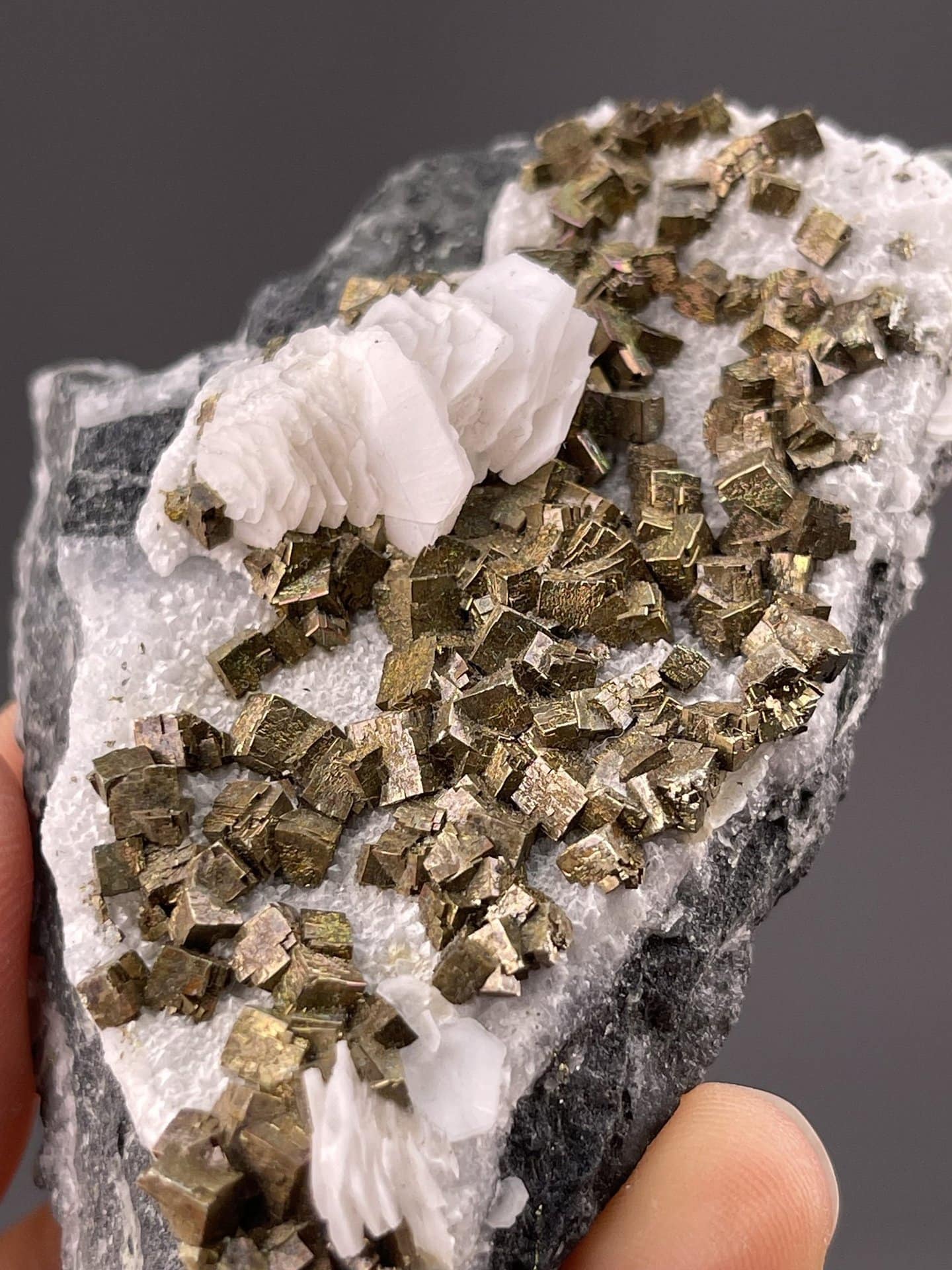 Detail of pyrite surface showing brilliant golden metallic sheen