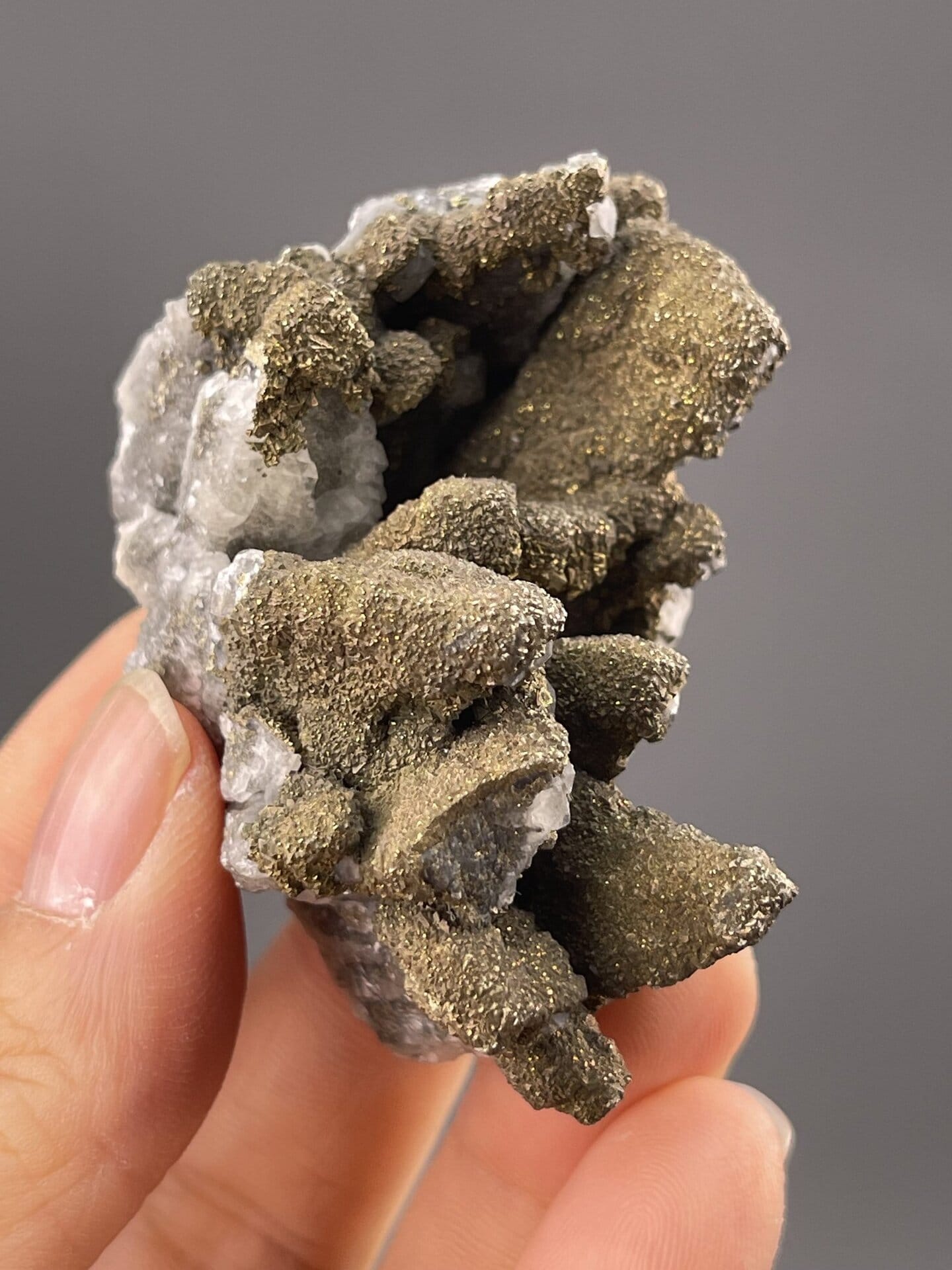 Detail of pyrite crystals showing brilliant golden metallic sheen