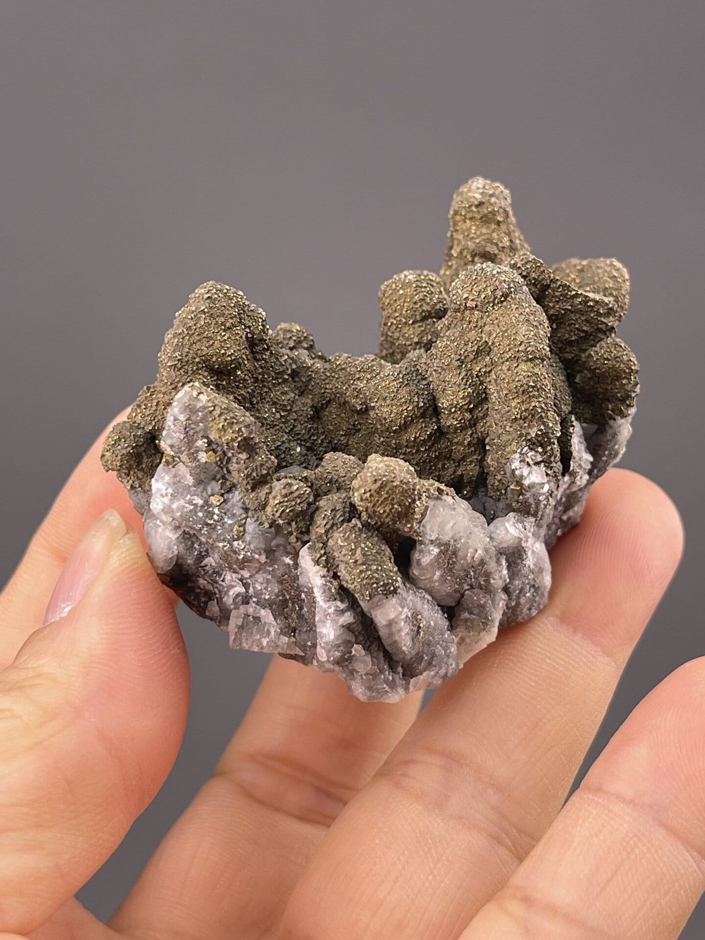 Angled view of Daye Mine pyrite highlighting druzy texture