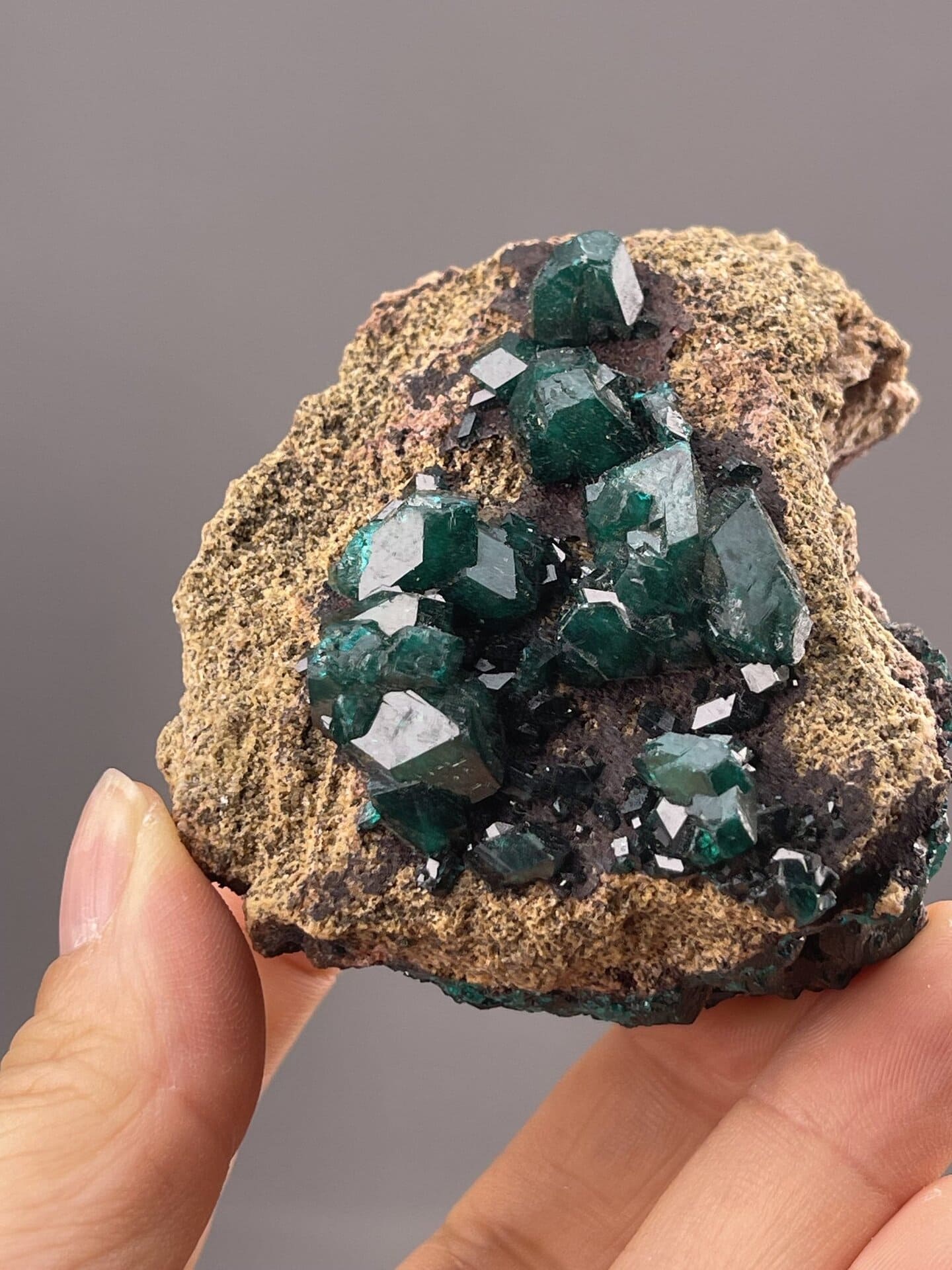 Detail of dioptase crystal terminations and emerald-green body colour