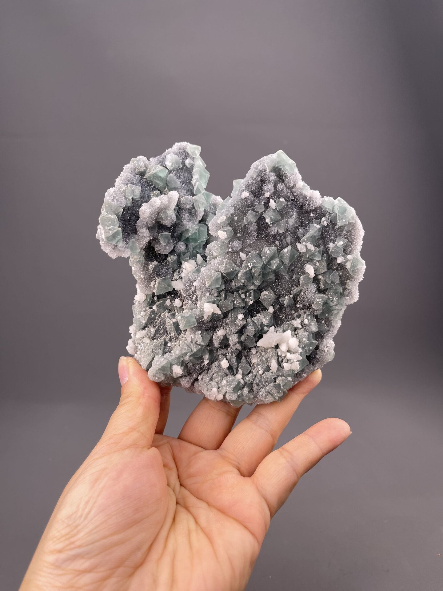 Side view of fluorite cluster showing crystal arrangement