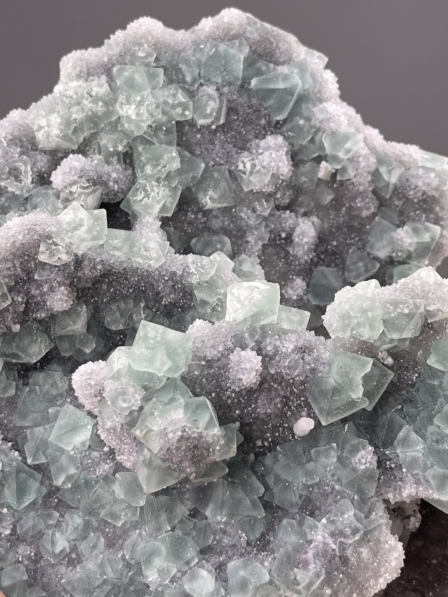 Angled view of Fujian fluorite cluster highlighting green colour