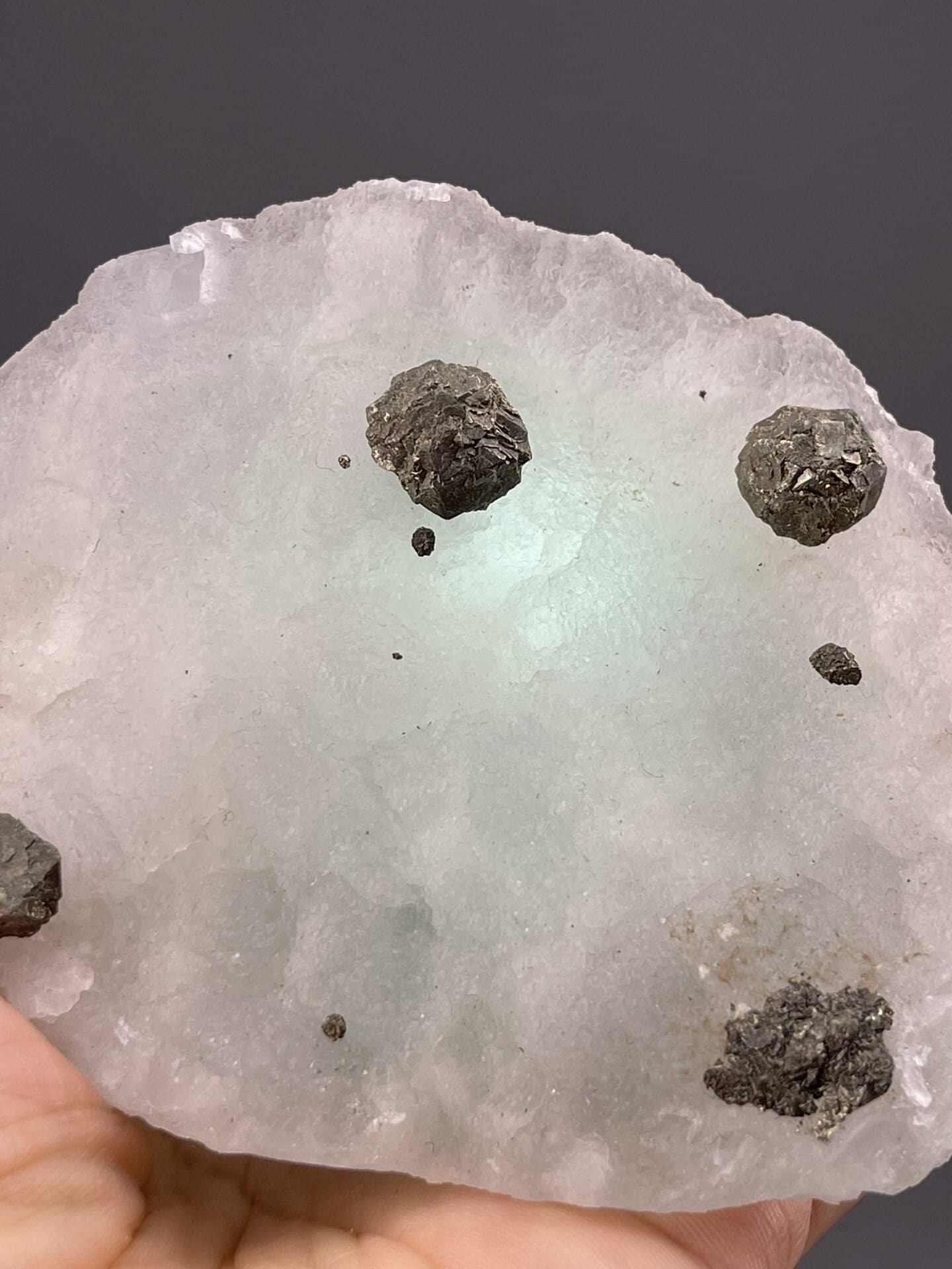 Front view of fluorite on magnetite, 37×10×30 mm, Inner Mongolia