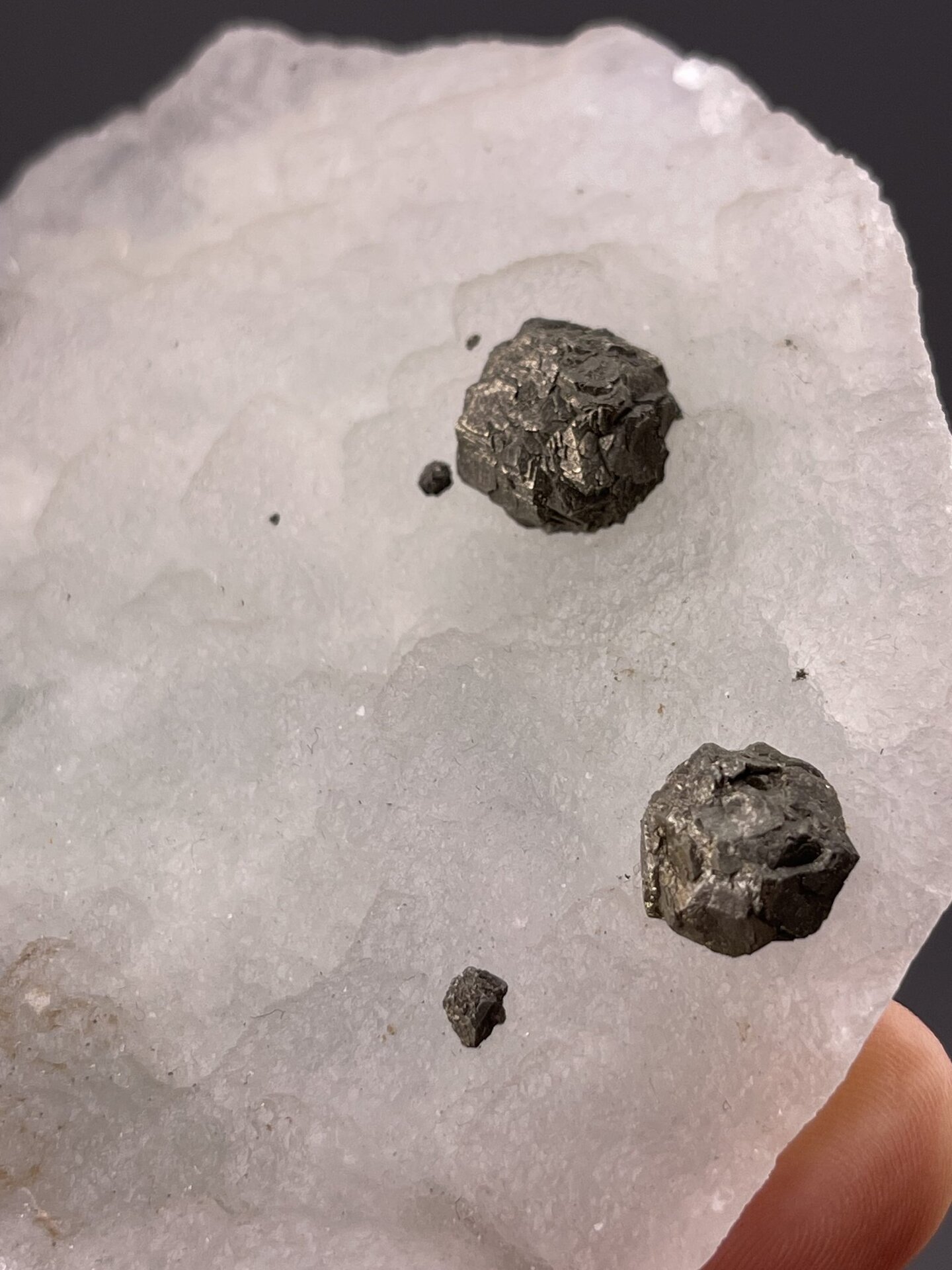 Detail of green fluorite faces showing vitreous luster