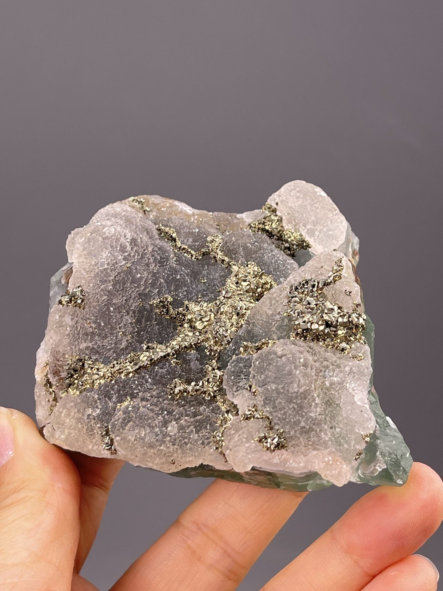 Side view of fluorite cluster showing crystal mass