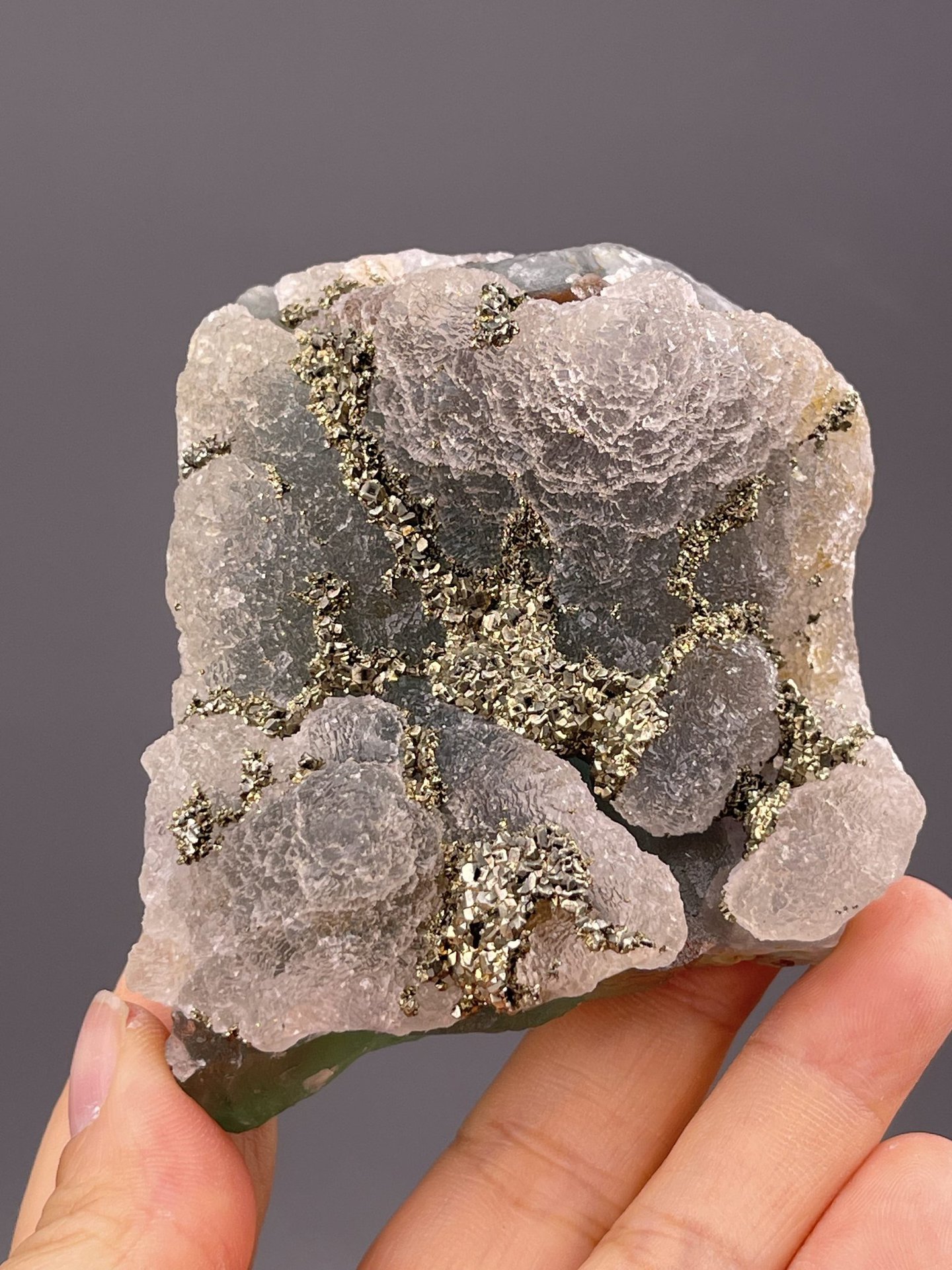 Top view of fluorite cluster showing green crystal surface
