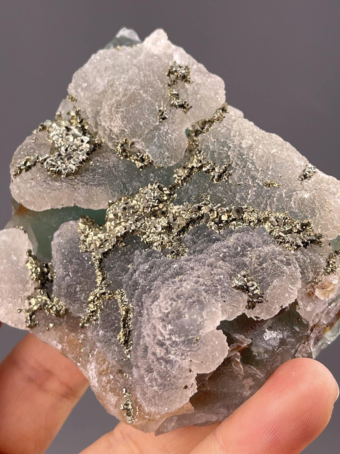 Angled view of Dexing City fluorite highlighting green colour