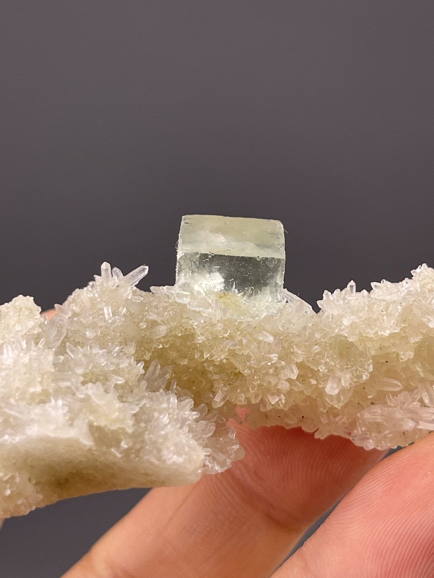 Pastel green fluorite cube on quartz, Xianghualing Mine, 1.2 g