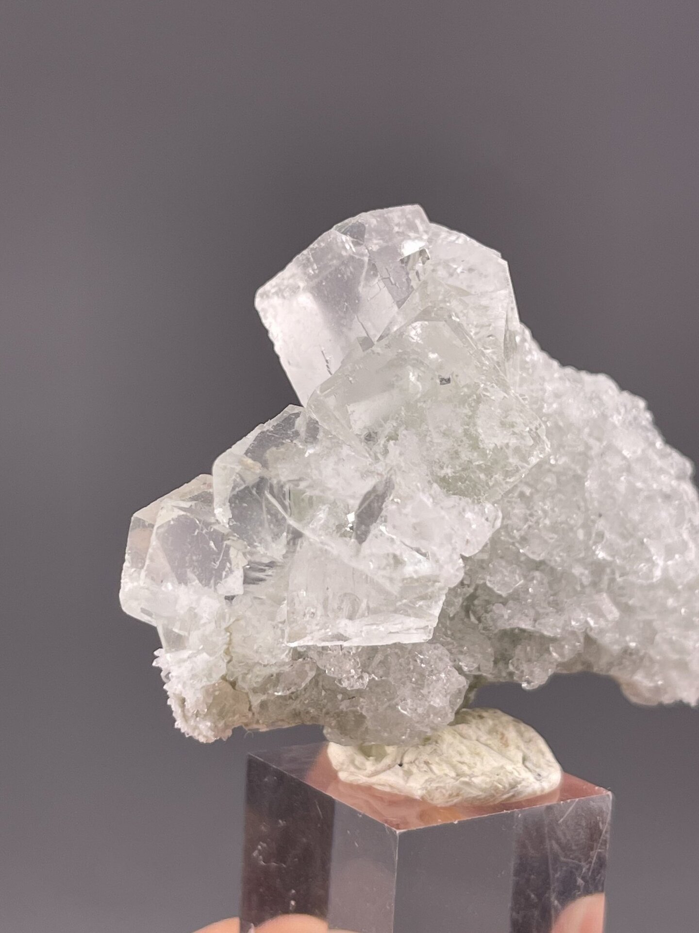 Close-up of green fluorite cube faces showing colour and luster