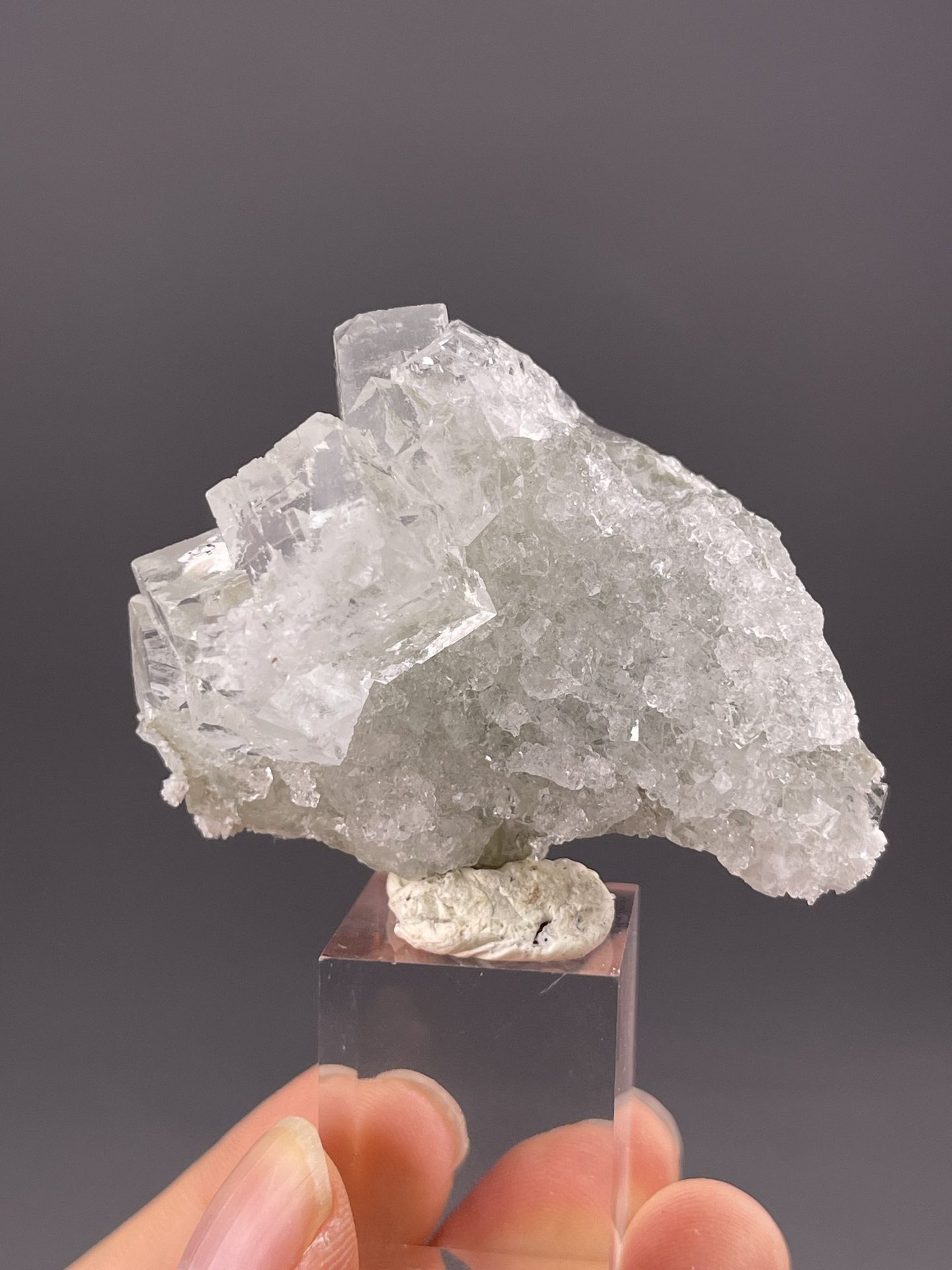 Side view of fluorite cube showing sharp crystallographic edges