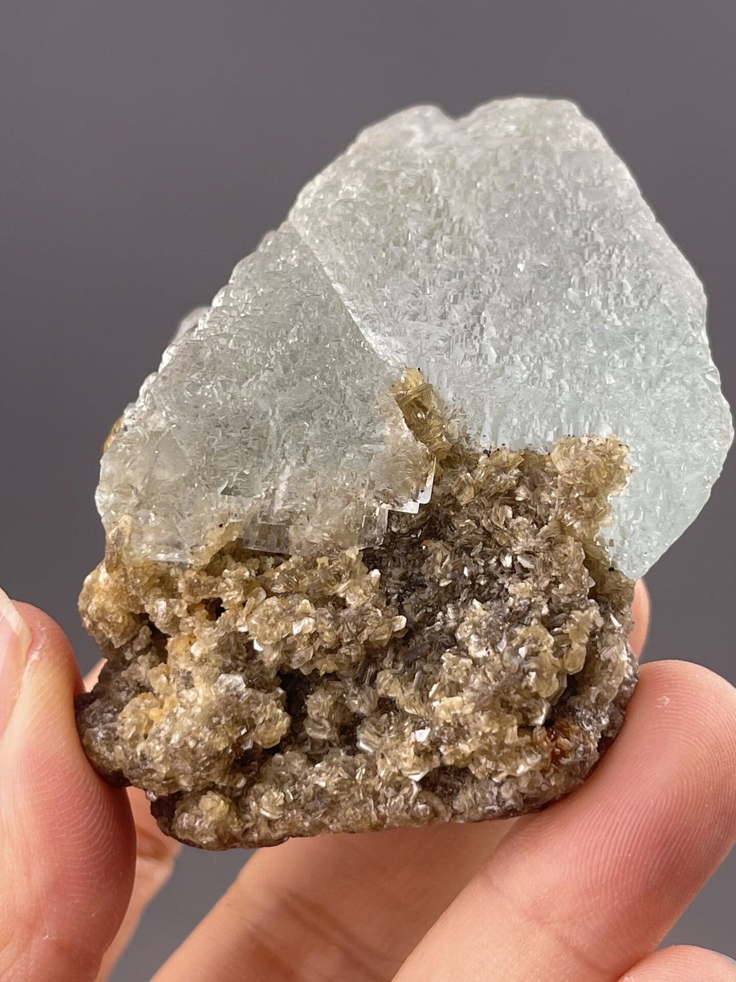 Fluorite Crystal with Color Variations from Yaogangxian Mine – angled view showing matrix