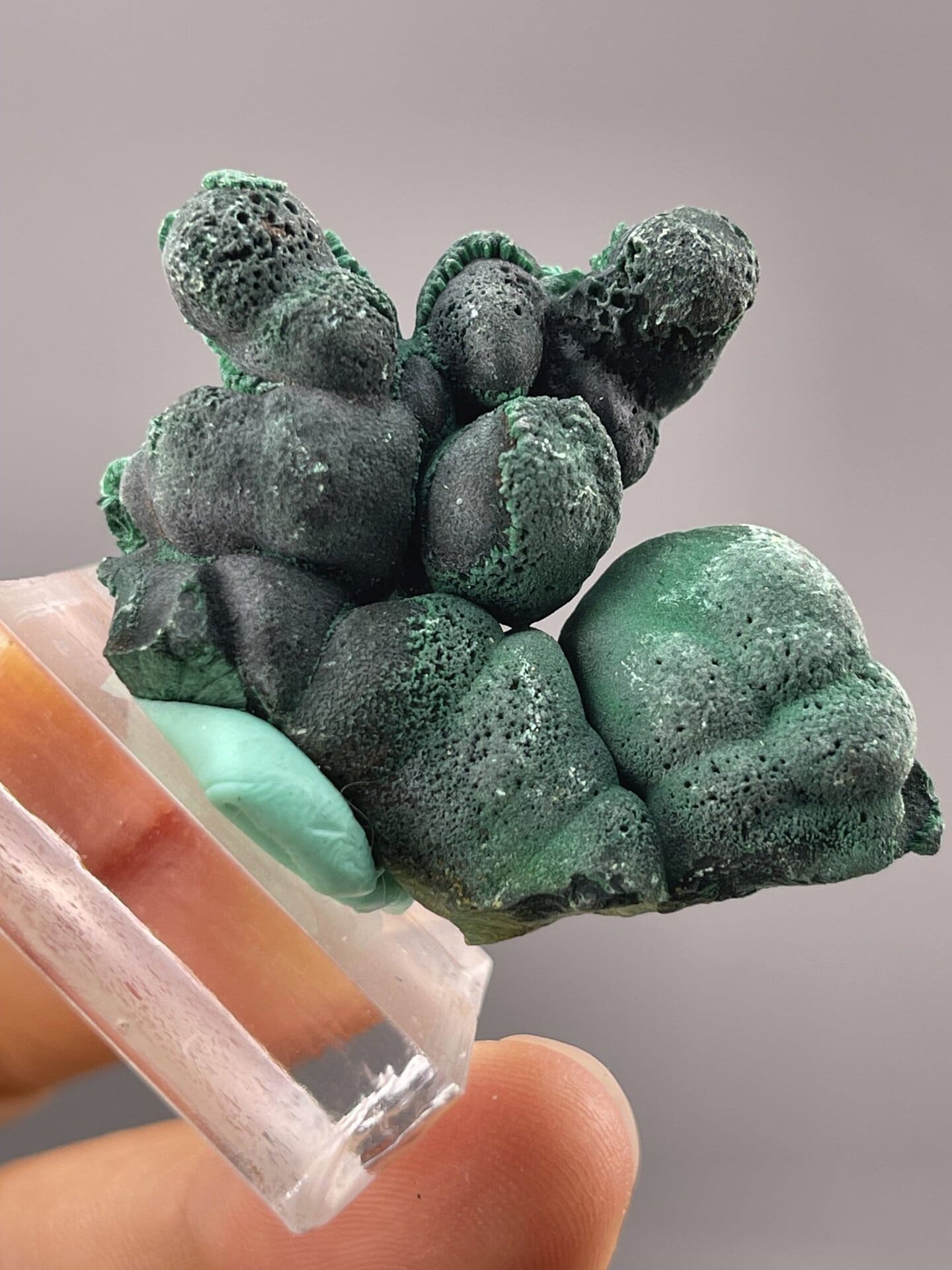 Angled view of Congo malachite highlighting green botryoidal form