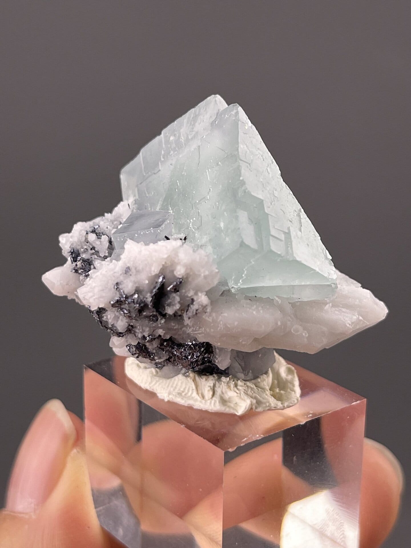 Angled view of Yaogangxian quartz highlighting pseudocubic form