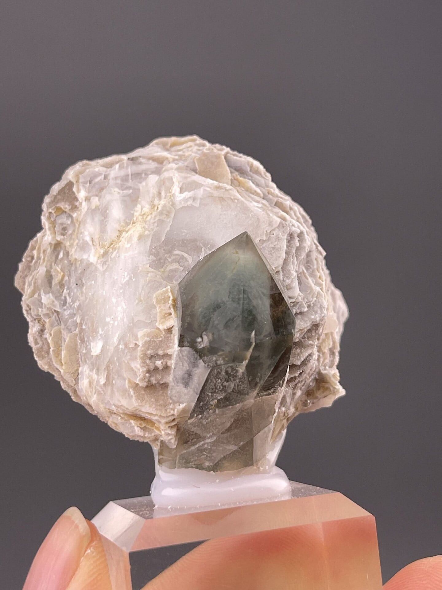 Close-up of green quartz crystal faces showing colour and luster