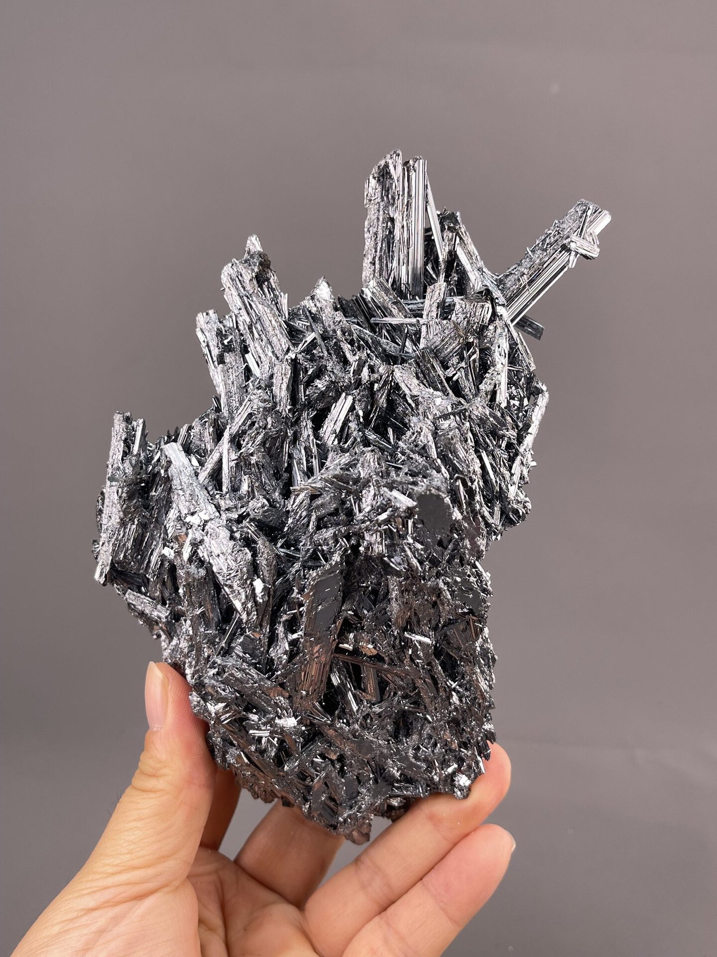 Stibnite Crystal Formation from Hunan, China – full specimen against white background