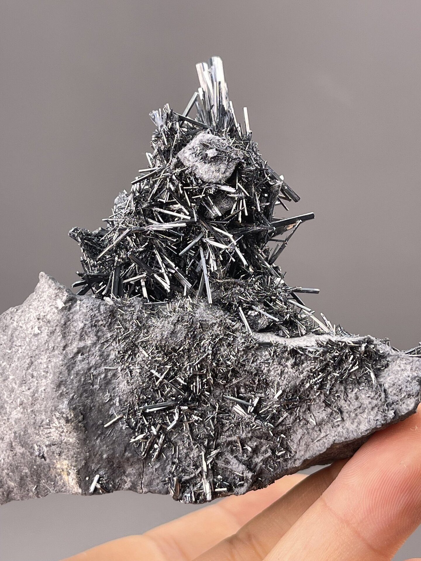 Stibnite Crystals from Lengshuijiang, China – full specimen against white background