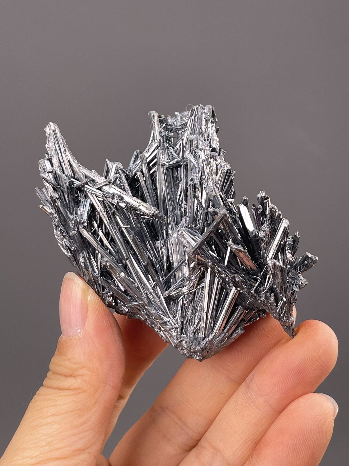 Close-up of acicular stibnite showing metallic gray needles