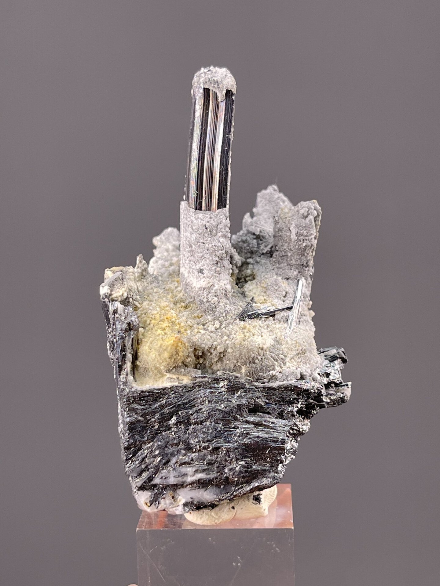 Close-up of stibnite column showing metallic gray colour