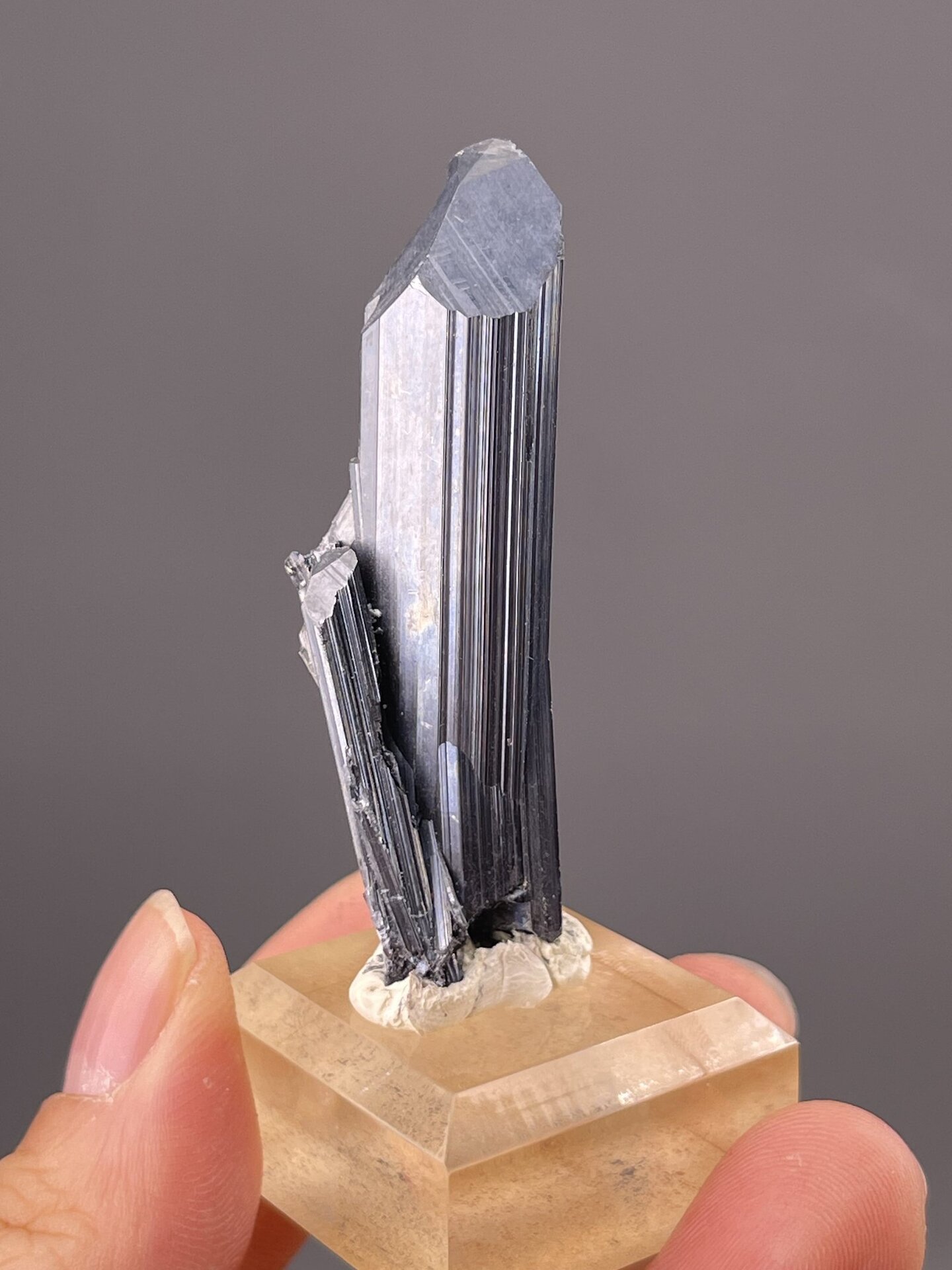 Metallic stibnite crystal showing elongated prismatic habit, 0.7 g