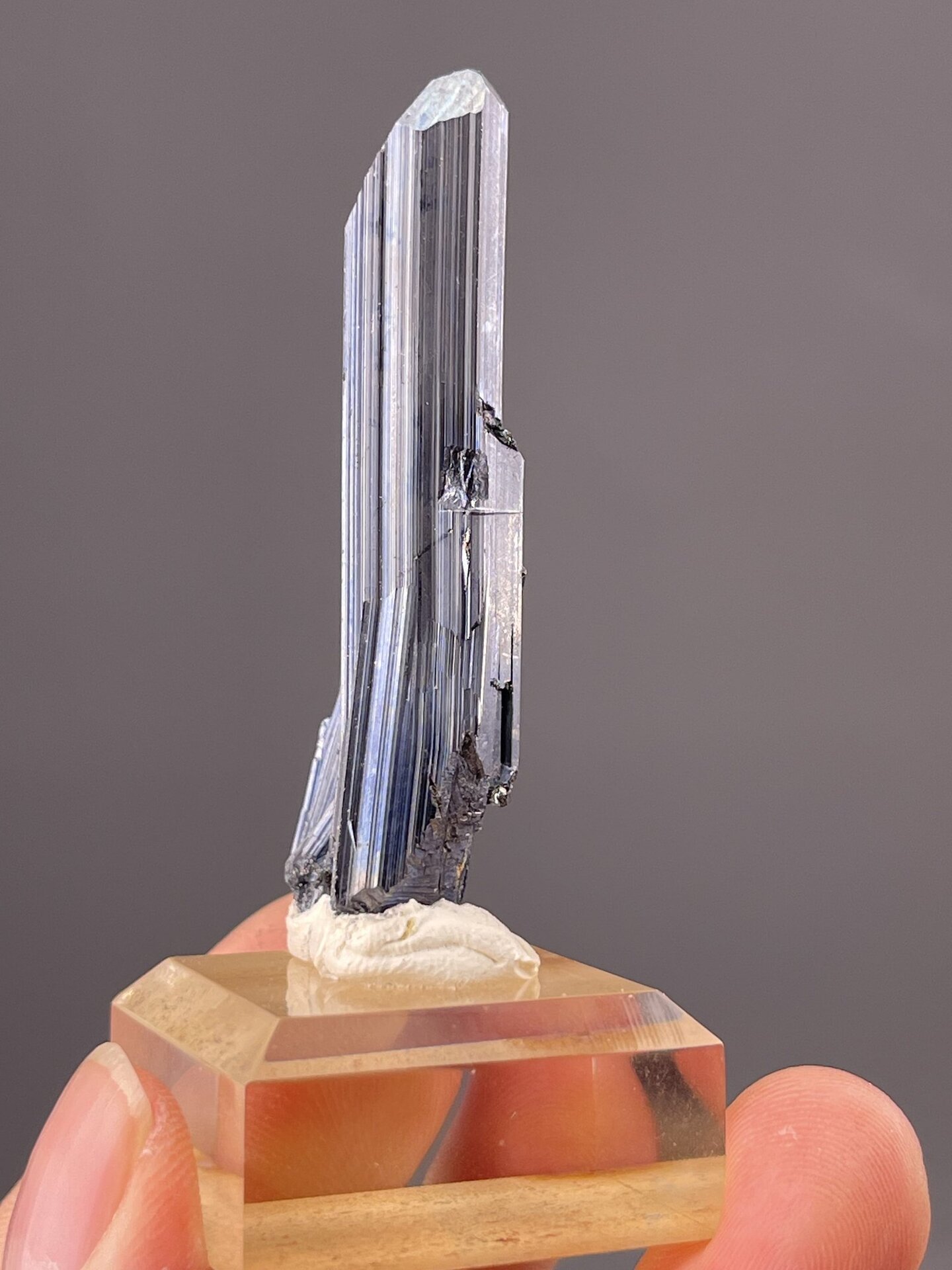 Side view of prismatic stibnite showing full crystal length