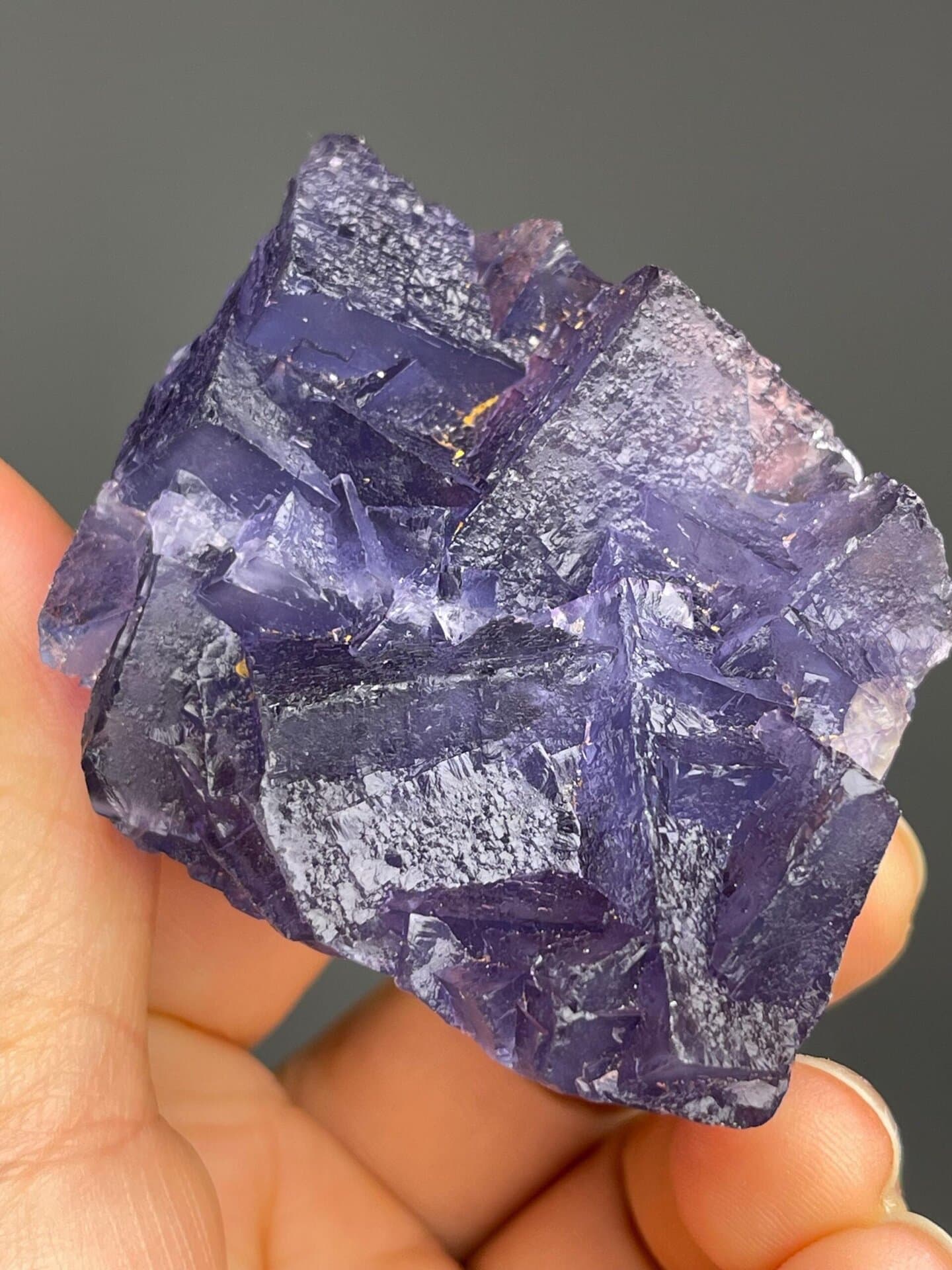 Top-down view of purple fluorite crystal arrangement