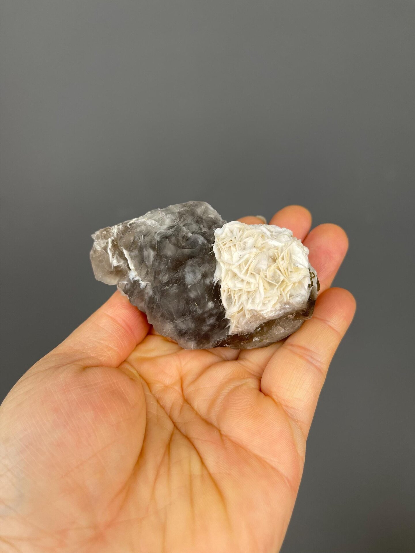 Crystal faces of dark green fluorite showing vitreous luster