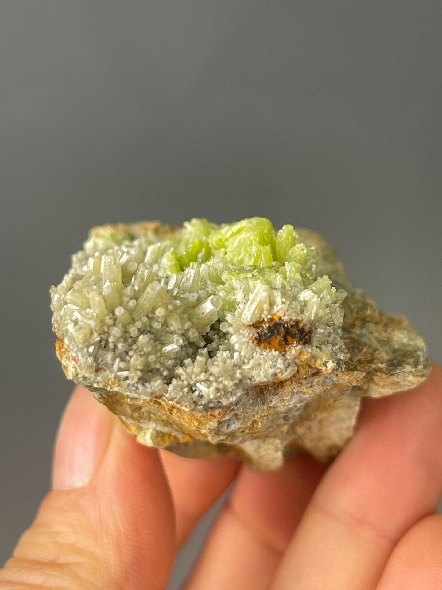 Dense green pyromorphite formation on natural matrix