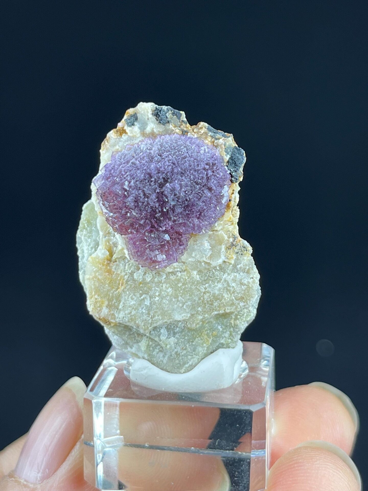 Close-up of deep purple spherical fluorite formations
