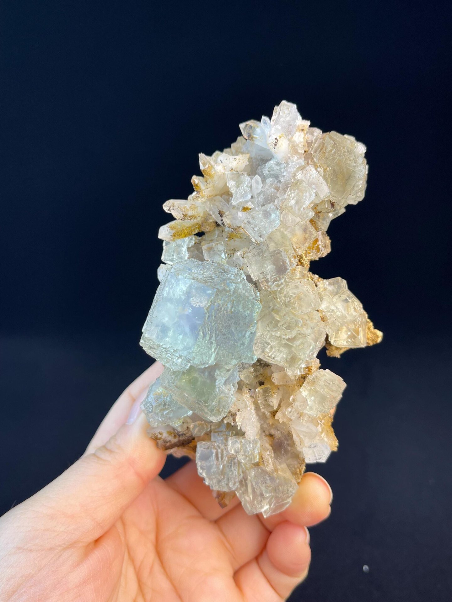 Back view of step-cut fluorite cluster