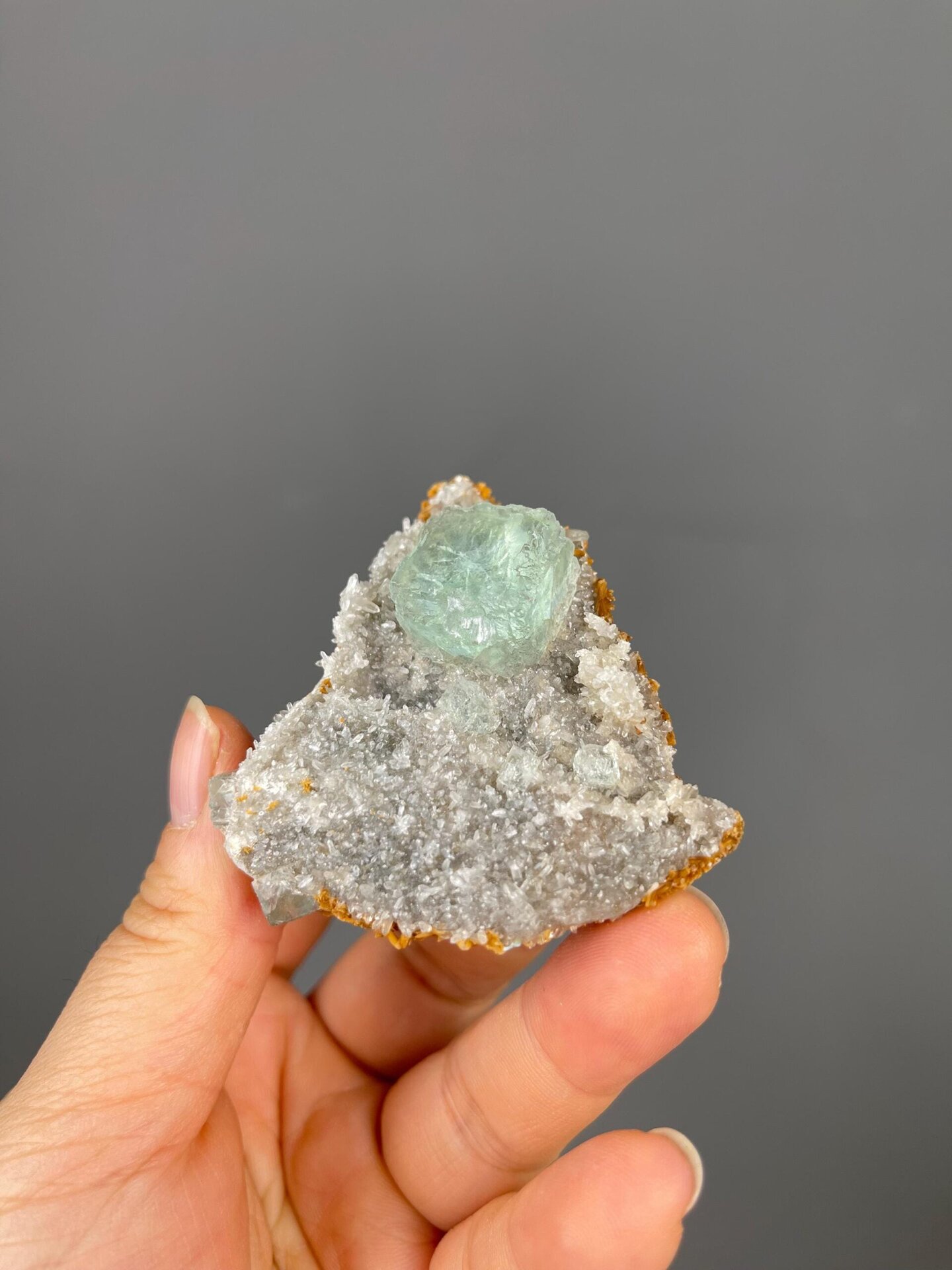 Close-up of translucent green fluorite cube face