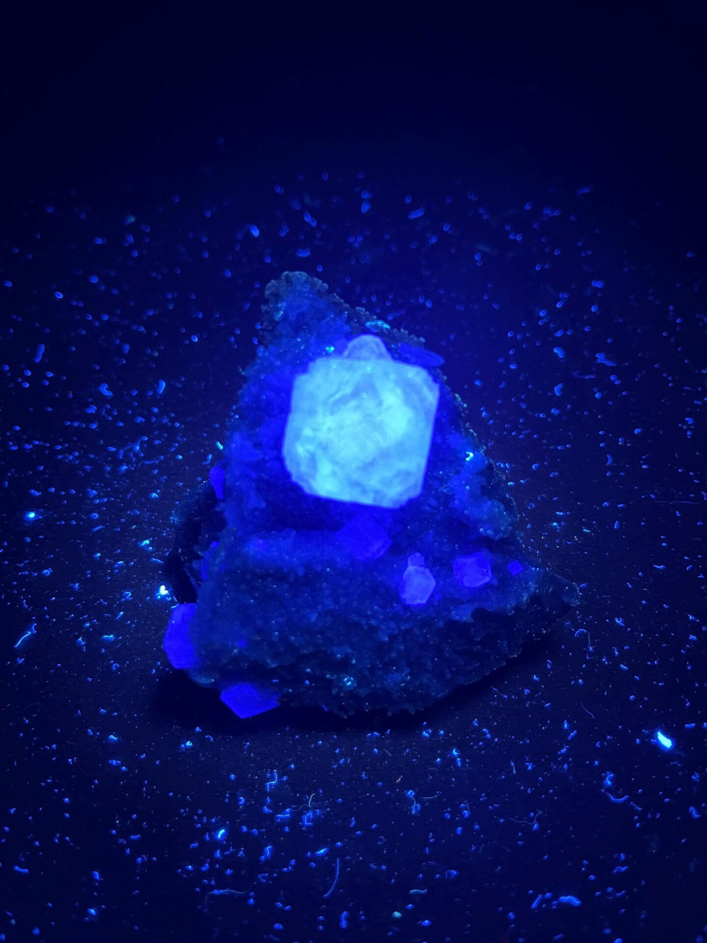 Vitreous luster on green fluorite cube faces