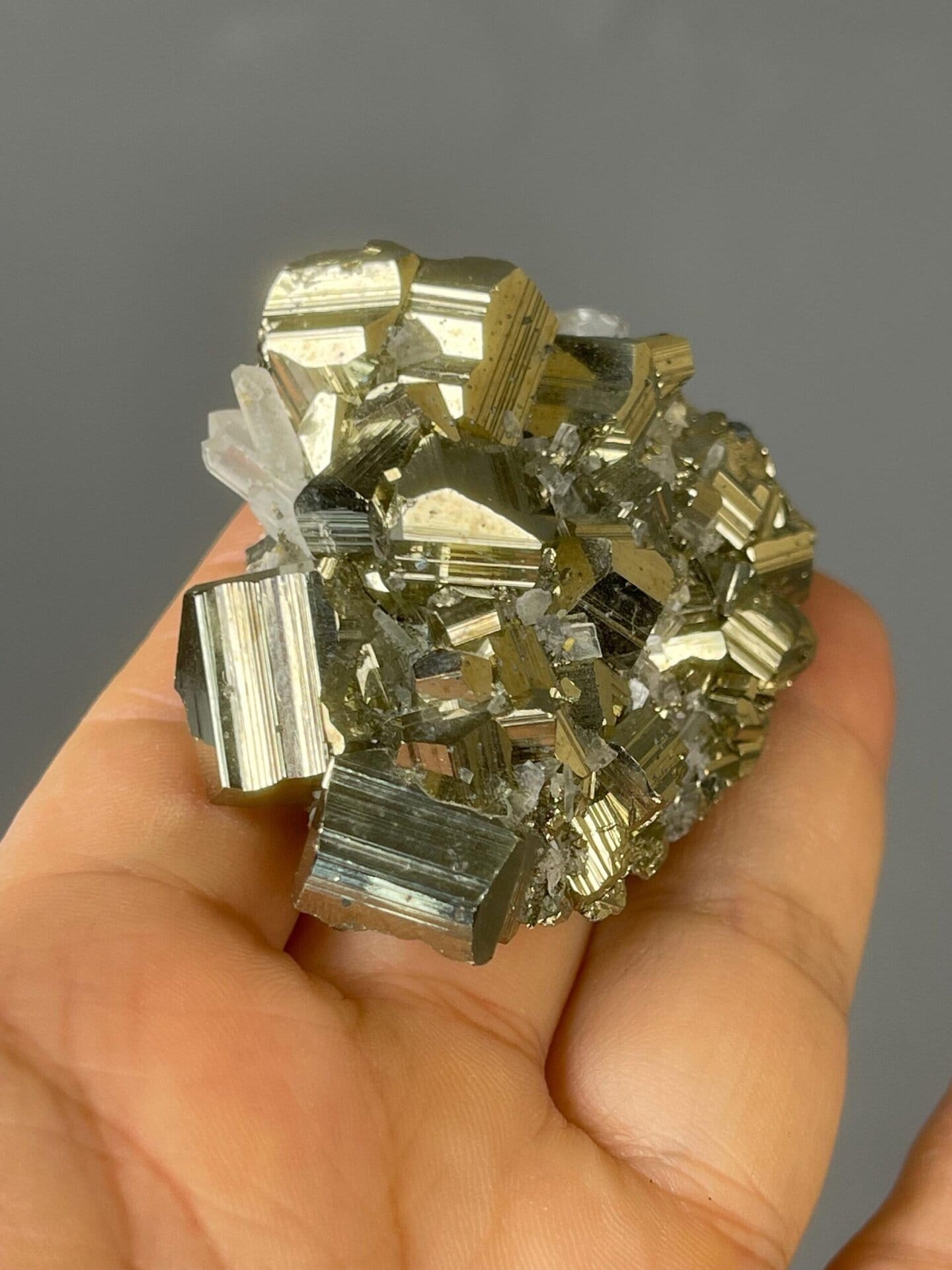 Pyrite cube faces showing mirror-like metallic luster