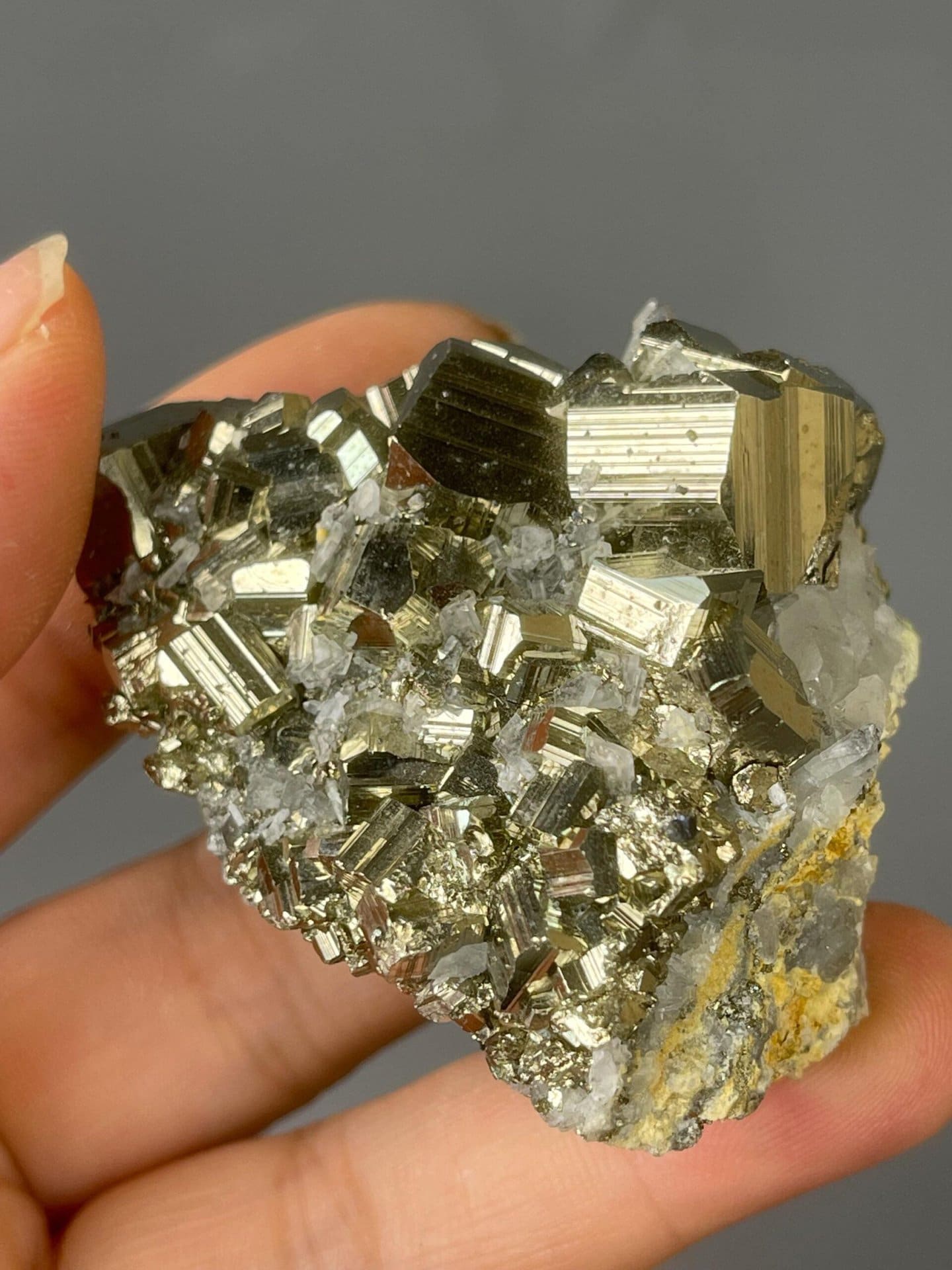Back view of pyrite and quartz cluster base