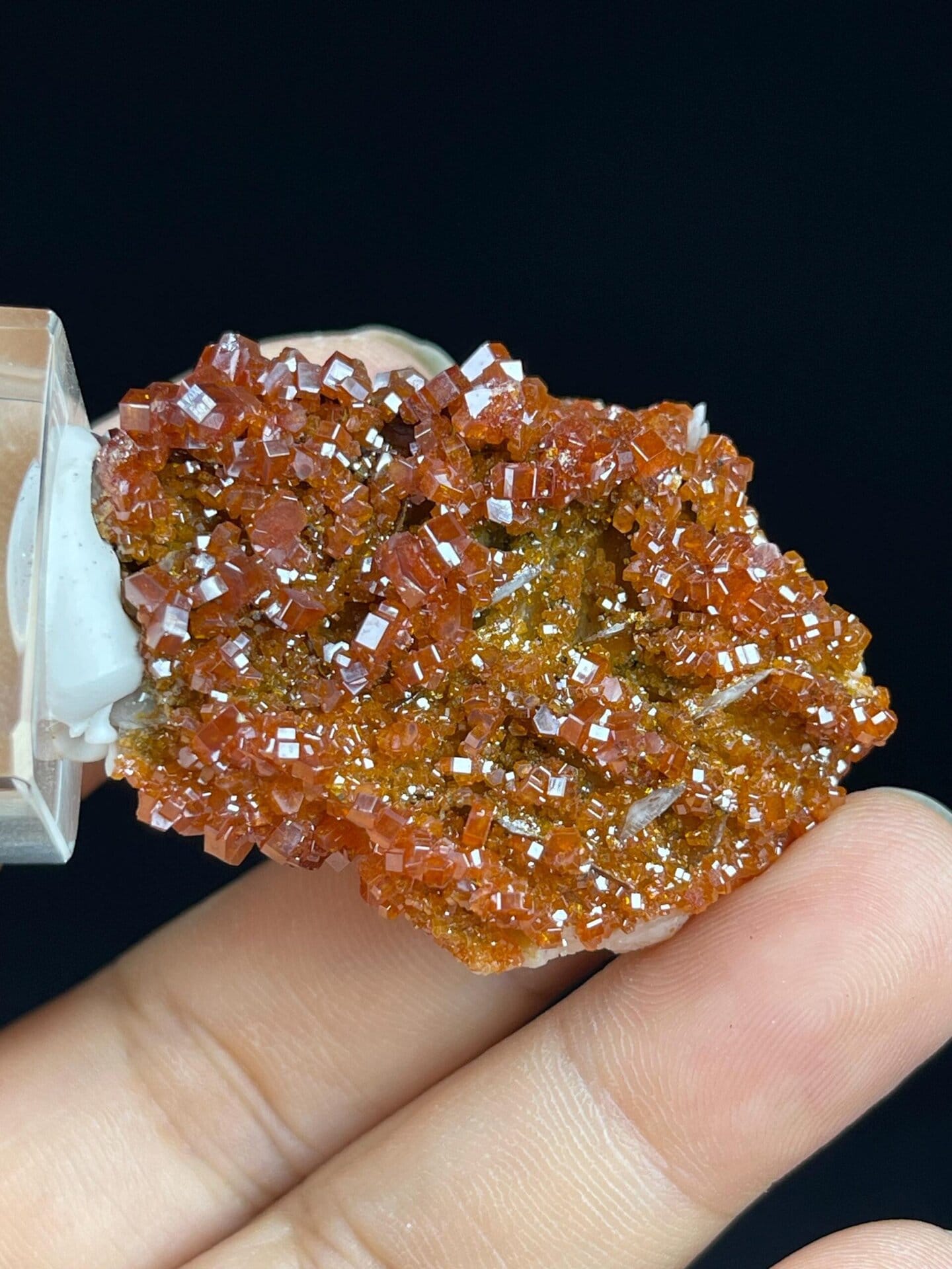Adamantine luster on wulfenite crystal surfaces